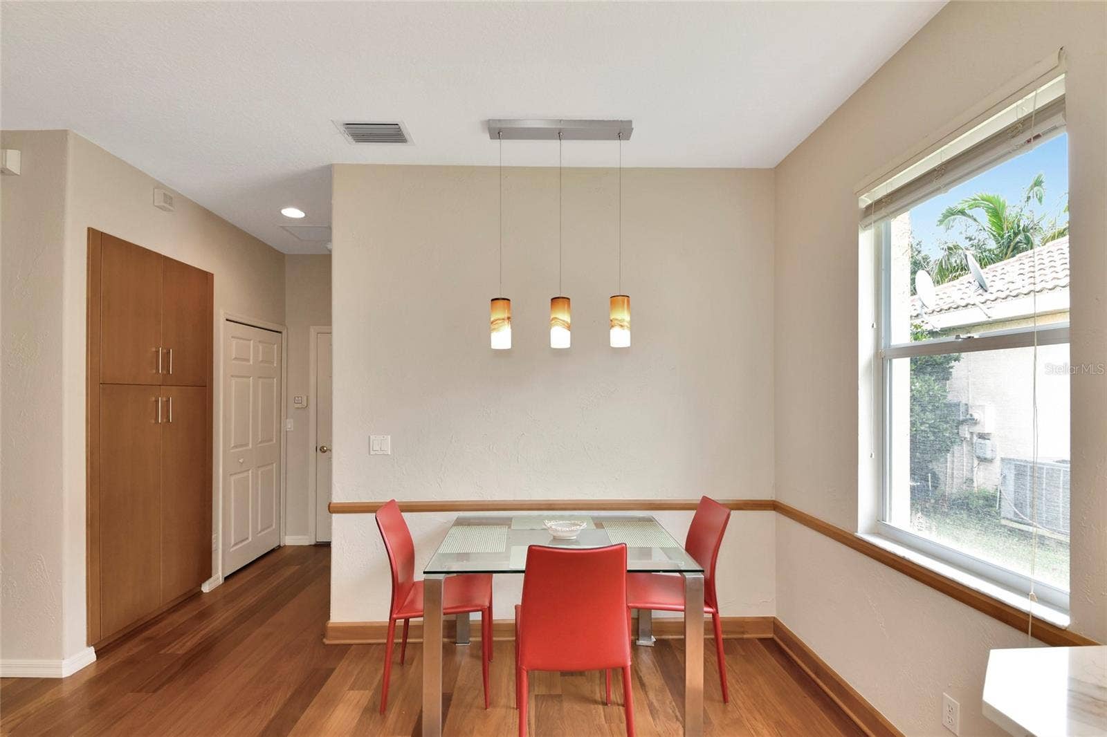 6256 DONNINGTON COURT, Sarasota, FL 34238 Dinette, note added pantry and hall closet next to laundry and garage access.