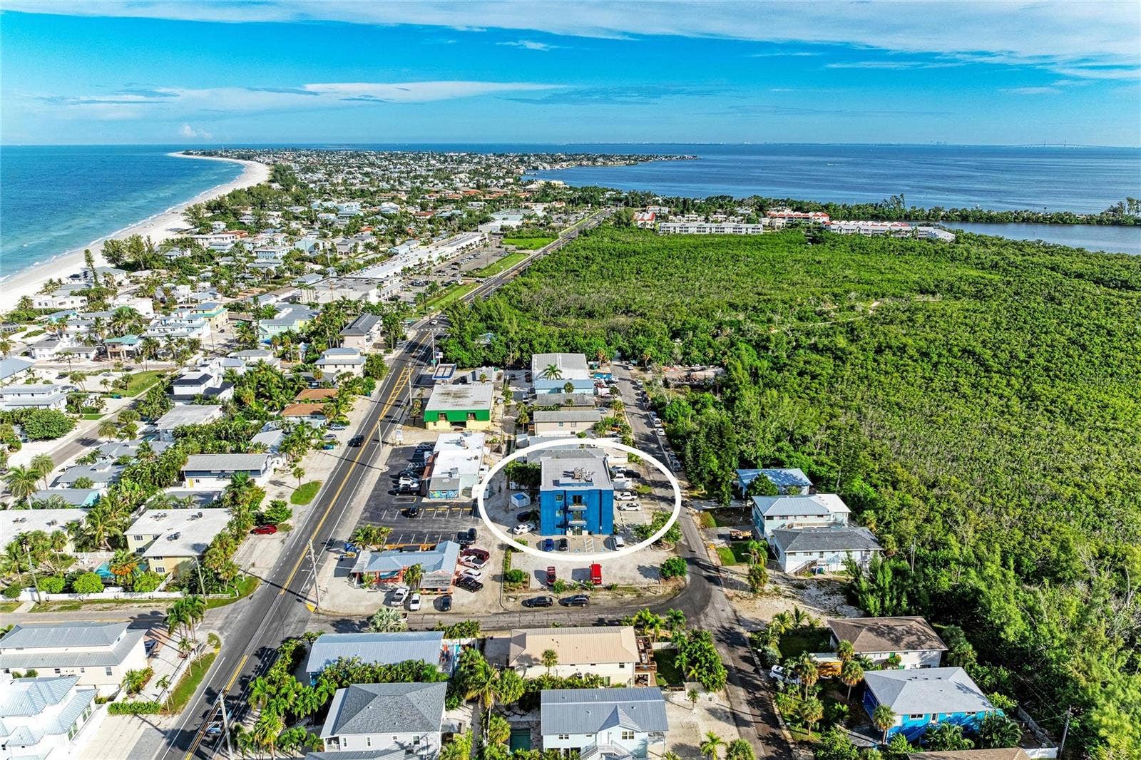 3004 AVENUE C, Holmes Beach, FL 34217 Aerial to the North - East Bay Drive in the distance