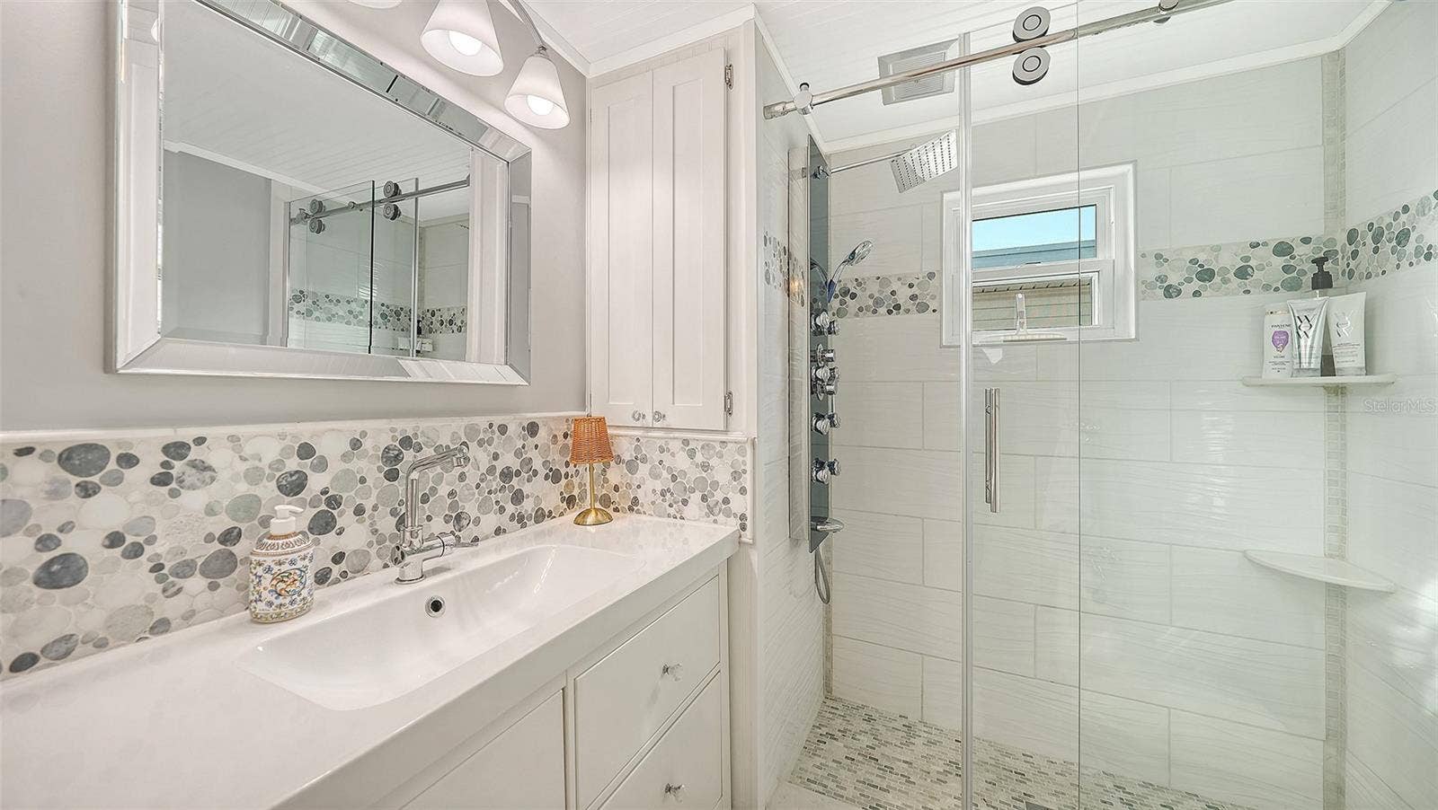 Owners bathroom with stall shower