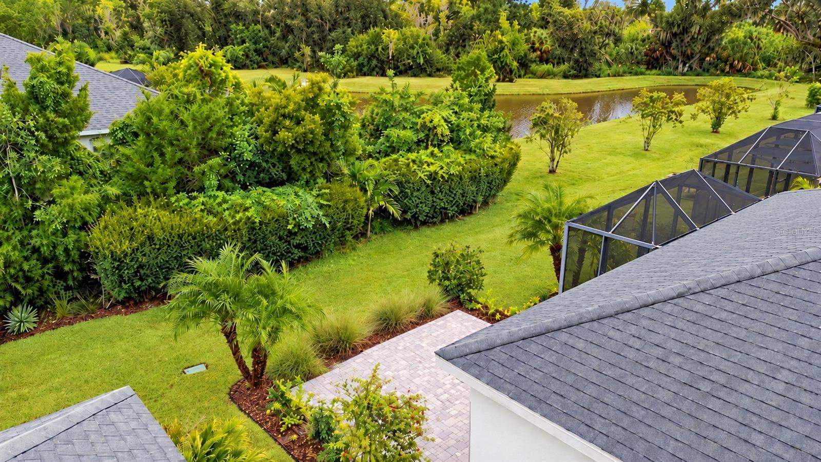 11115 SAND PINE LANE, Parrish, FL 34219 Lake and preserve views from the extended lanai
