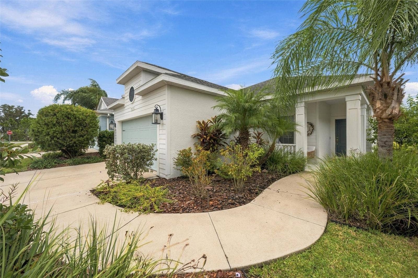11115 SAND PINE LANE, Parrish, FL 34219 Nature-filled entry path
