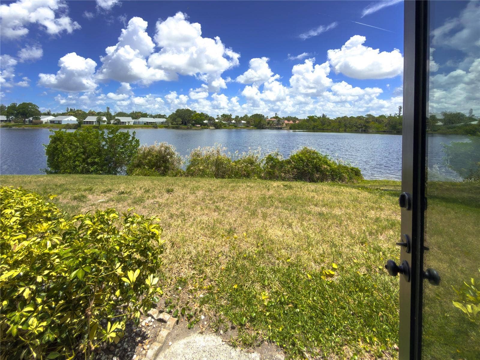 220 LAKEWOOD DRIVE, #220, Bradenton, FL 34210 beautiful lake view from lanai!