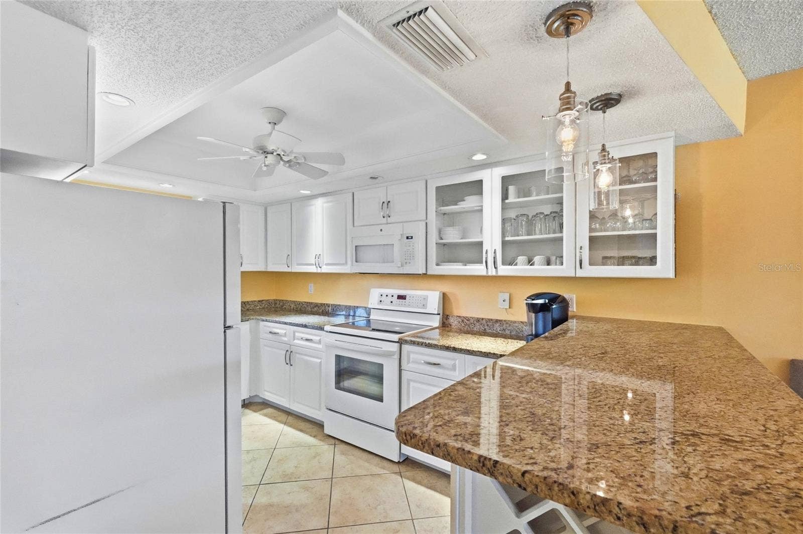 600 MANATEE AVENUE, #144, Holmes Beach, FL 34217 White appliances