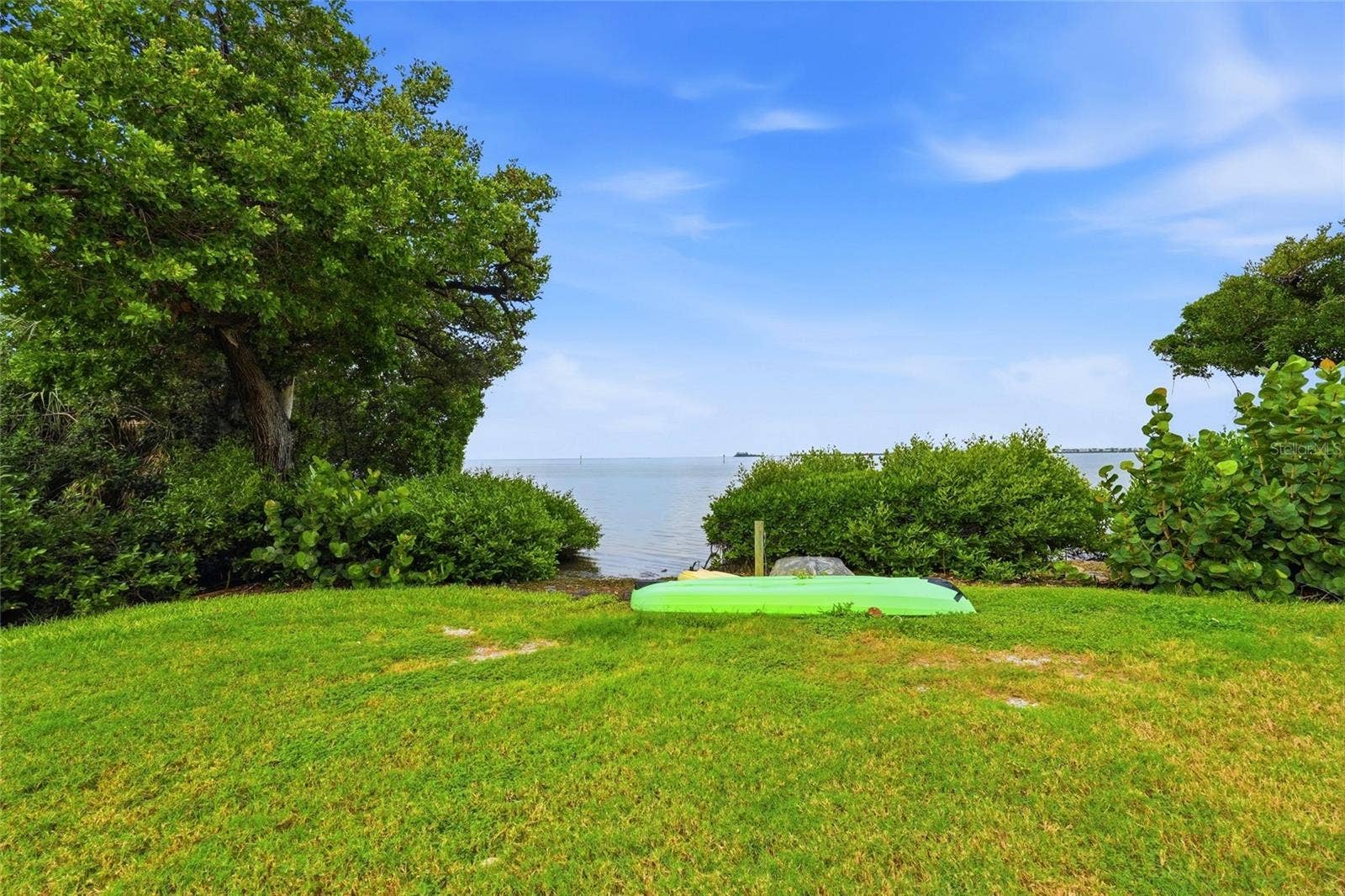 600 MANATEE AVENUE, #144, Holmes Beach, FL 34217 Kayak launch area and partial view from back patio