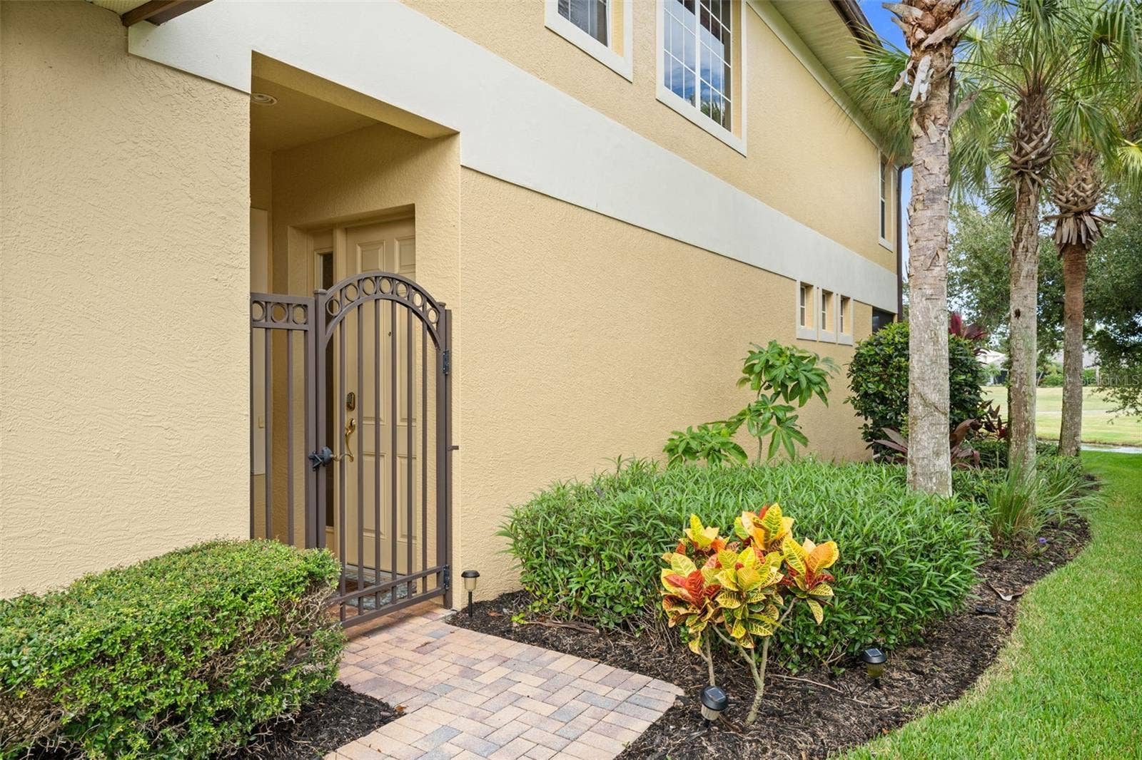 8432 MIRAMAR WAY, Lakewood Ranch, FL 34202 A tucked-away gated entrance adds privacy and a convenient spot for deliveries.