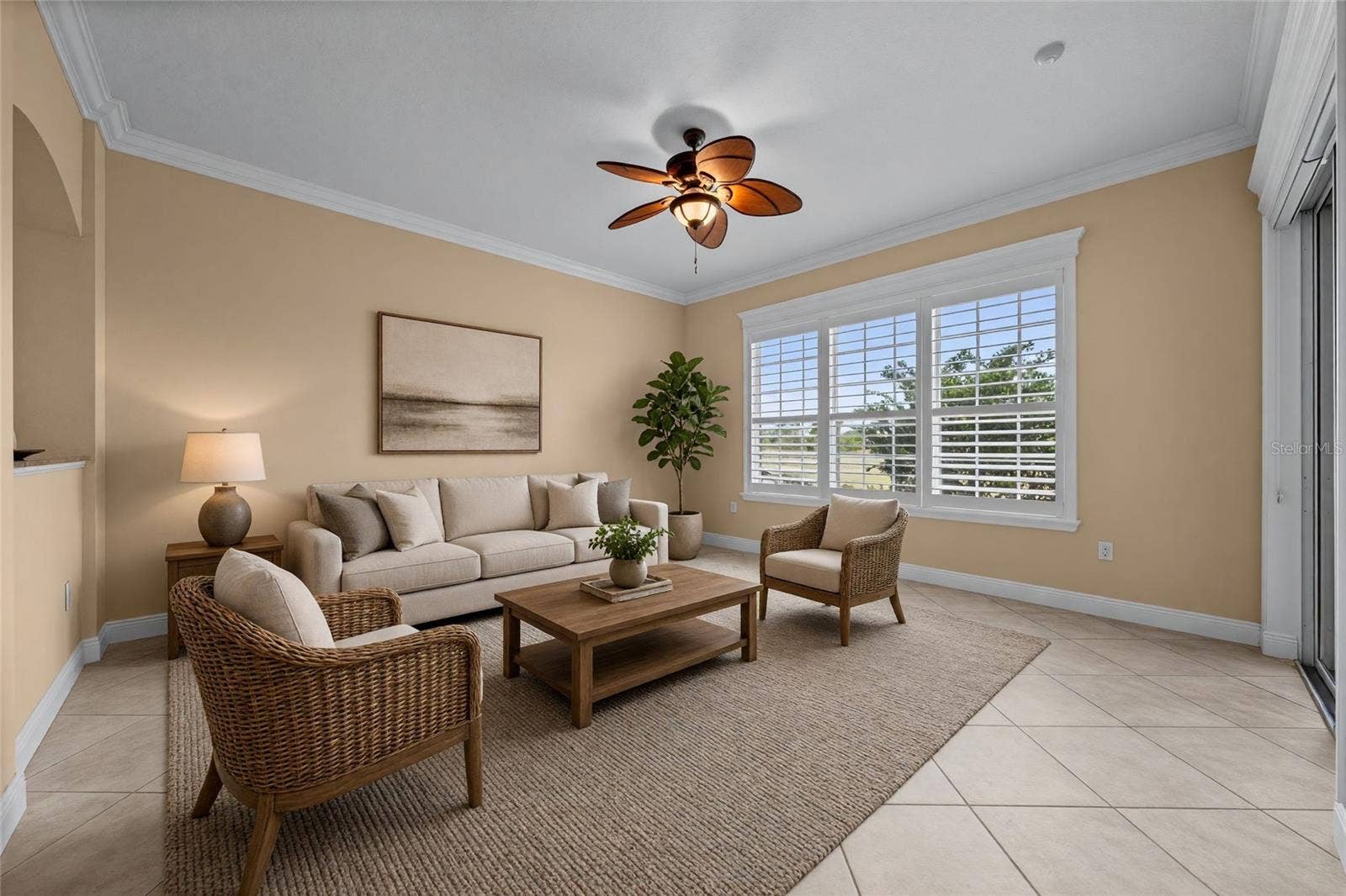 8432 MIRAMAR WAY, Lakewood Ranch, FL 34202 Just off the kitchen, this comfortable gathering space opens directly to the screened lanai.