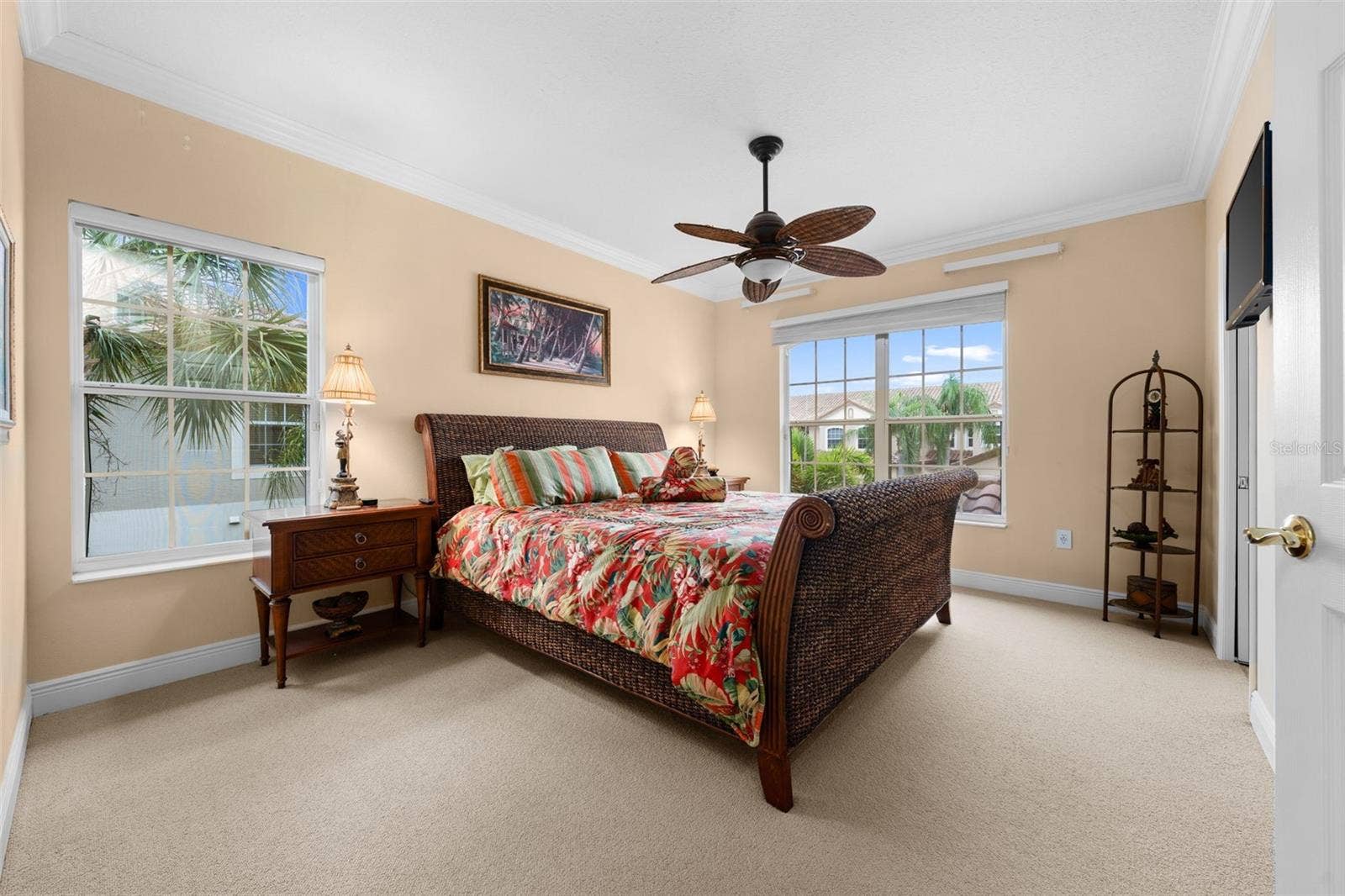 8432 MIRAMAR WAY, Lakewood Ranch, FL 34202 A bright, welcoming bedroom with plenty of natural light and room for overnight guests.