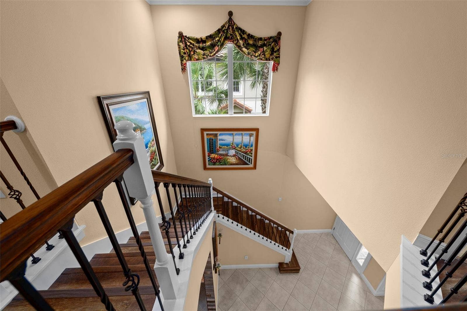 8432 MIRAMAR WAY, Lakewood Ranch, FL 34202 High ceilings and natural light create an open, airy feel between floors.