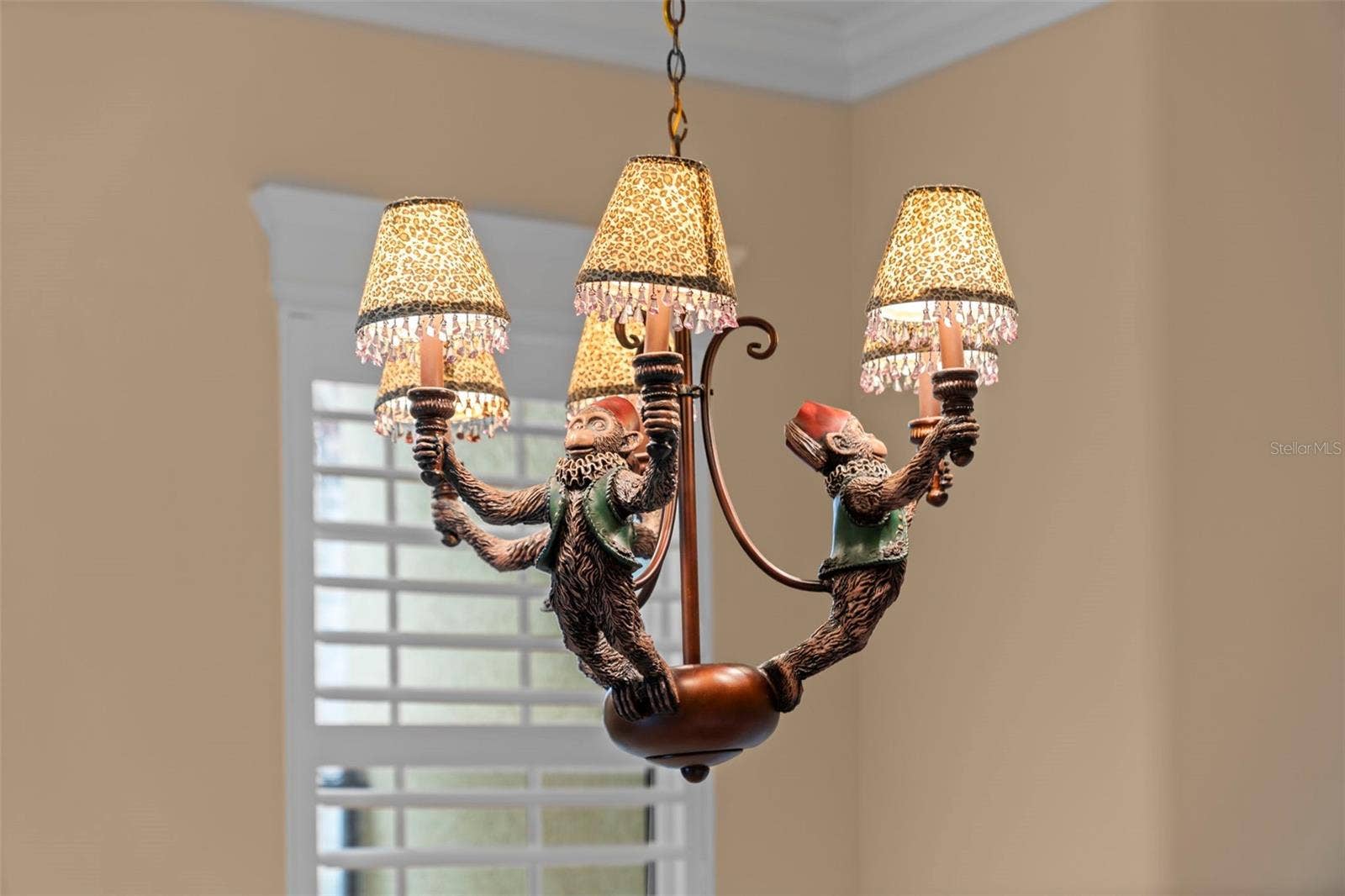 8432 MIRAMAR WAY, Lakewood Ranch, FL 34202 A distinctive chandelier brings character and a warm finishing touch to the dining room.