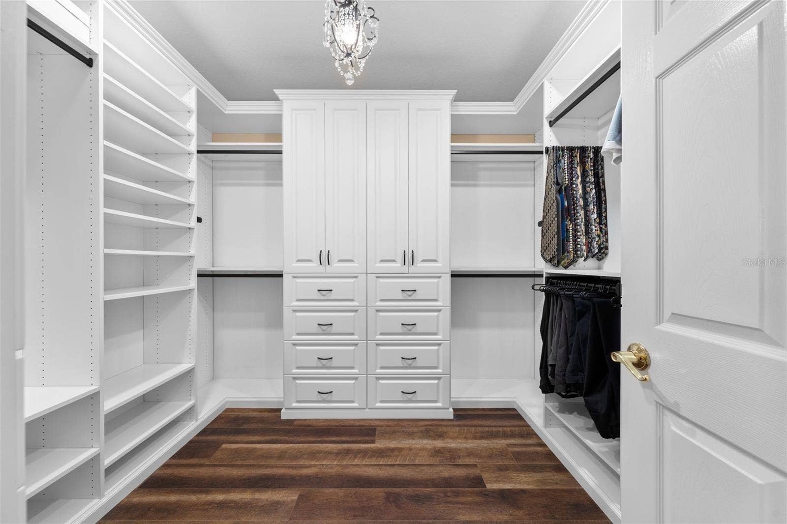 8432 MIRAMAR WAY, Lakewood Ranch, FL 34202 Keep everything organized with custom drawers, shelving, and generous hanging space in the walk-in closet.