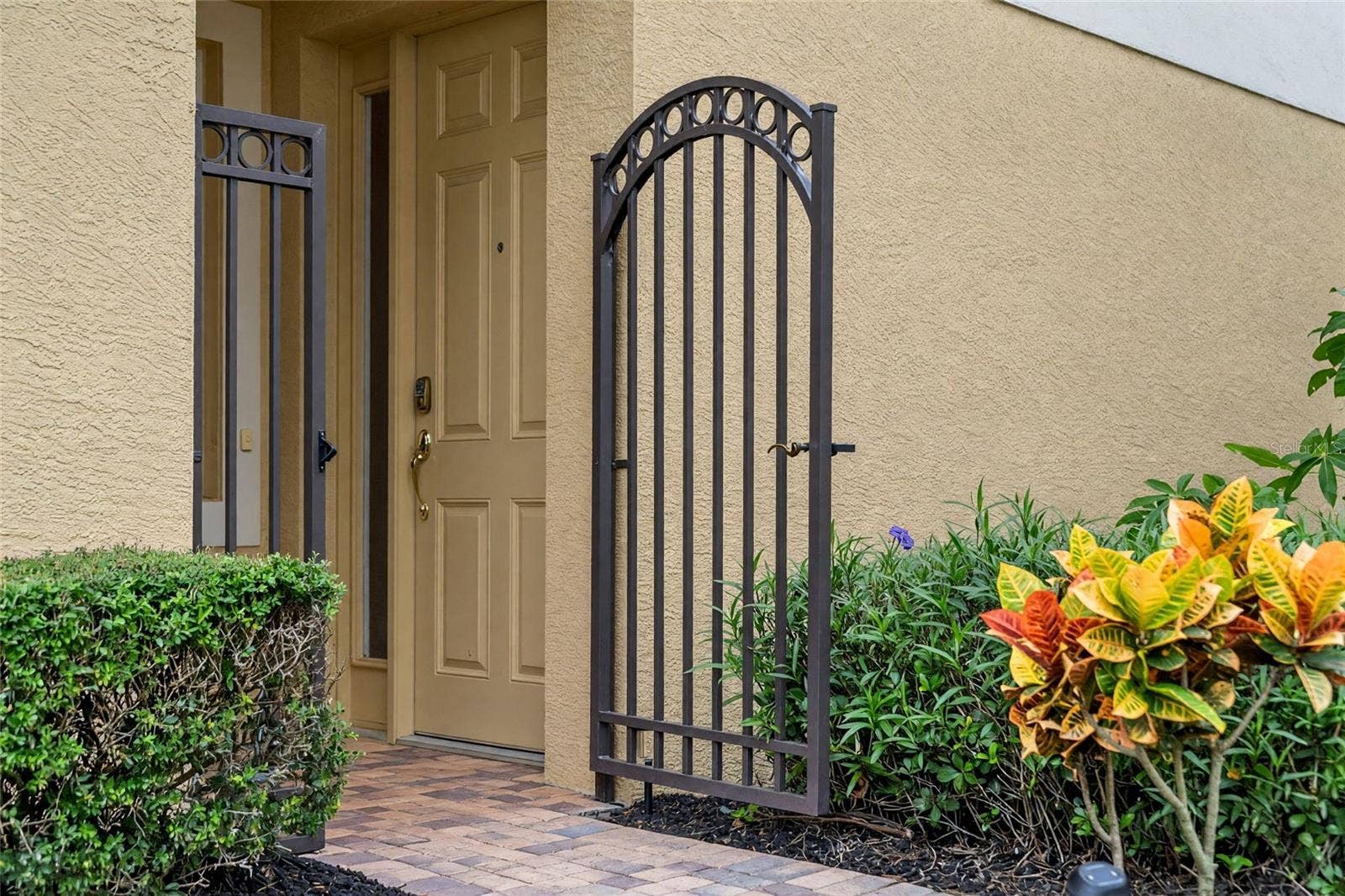 8432 MIRAMAR WAY, Lakewood Ranch, FL 34202 A tucked-away gated entrance adds privacy and a convenient spot for deliveries.