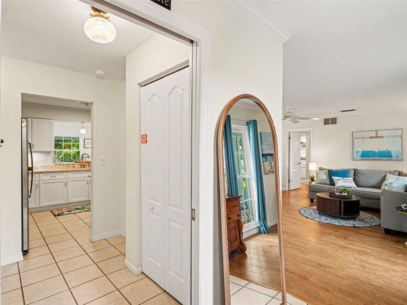 FOYER, LIVING KITCHEN, DUAL CLOSETS AT ENTRY