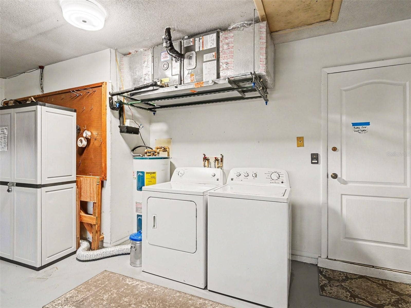 LAUNDRY/HOT WATER AND MECHANICALS.  A/C IS DONE!
