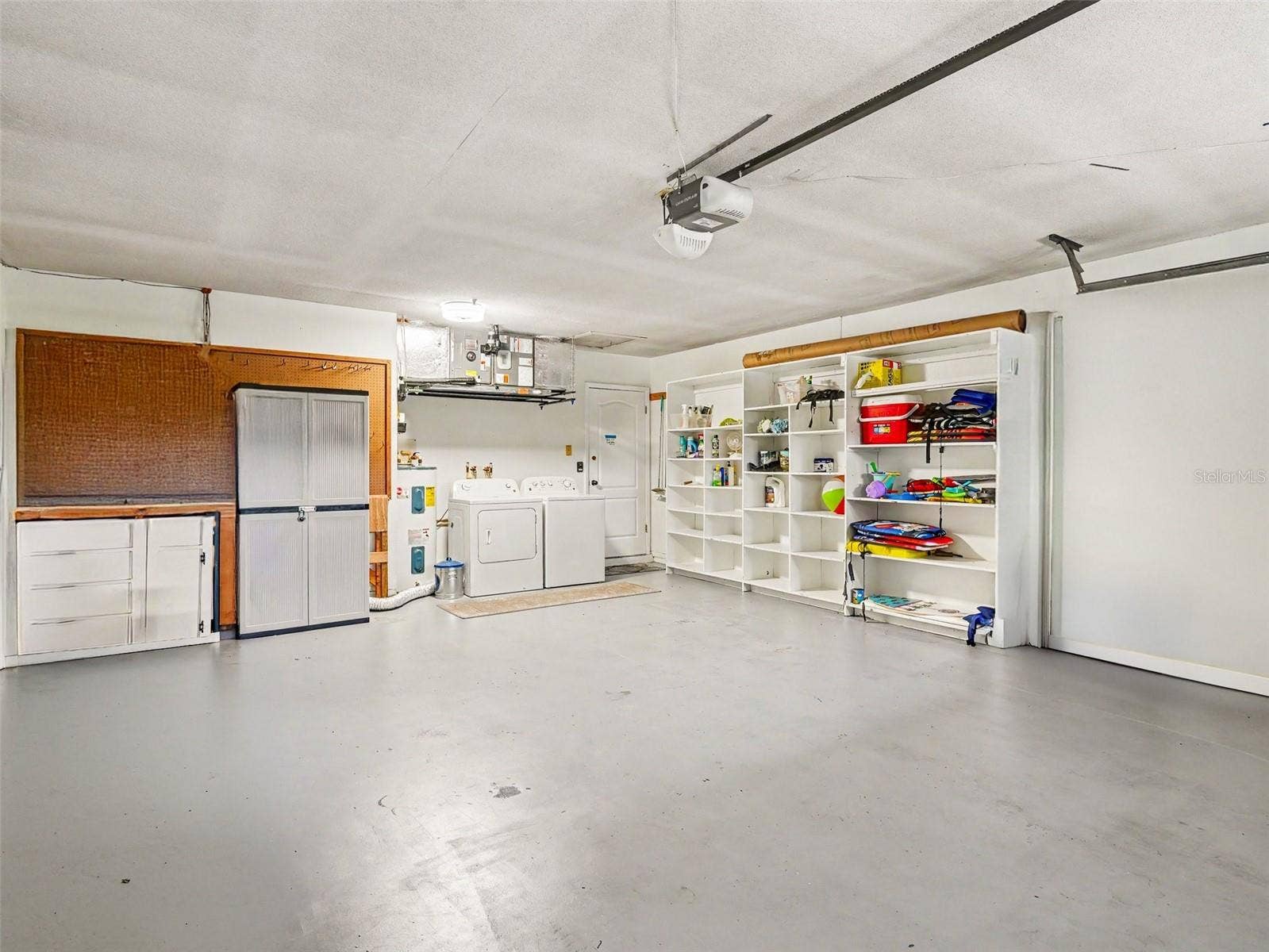 OVERSIZED GARAGE WITH BUILT IN SHELVING