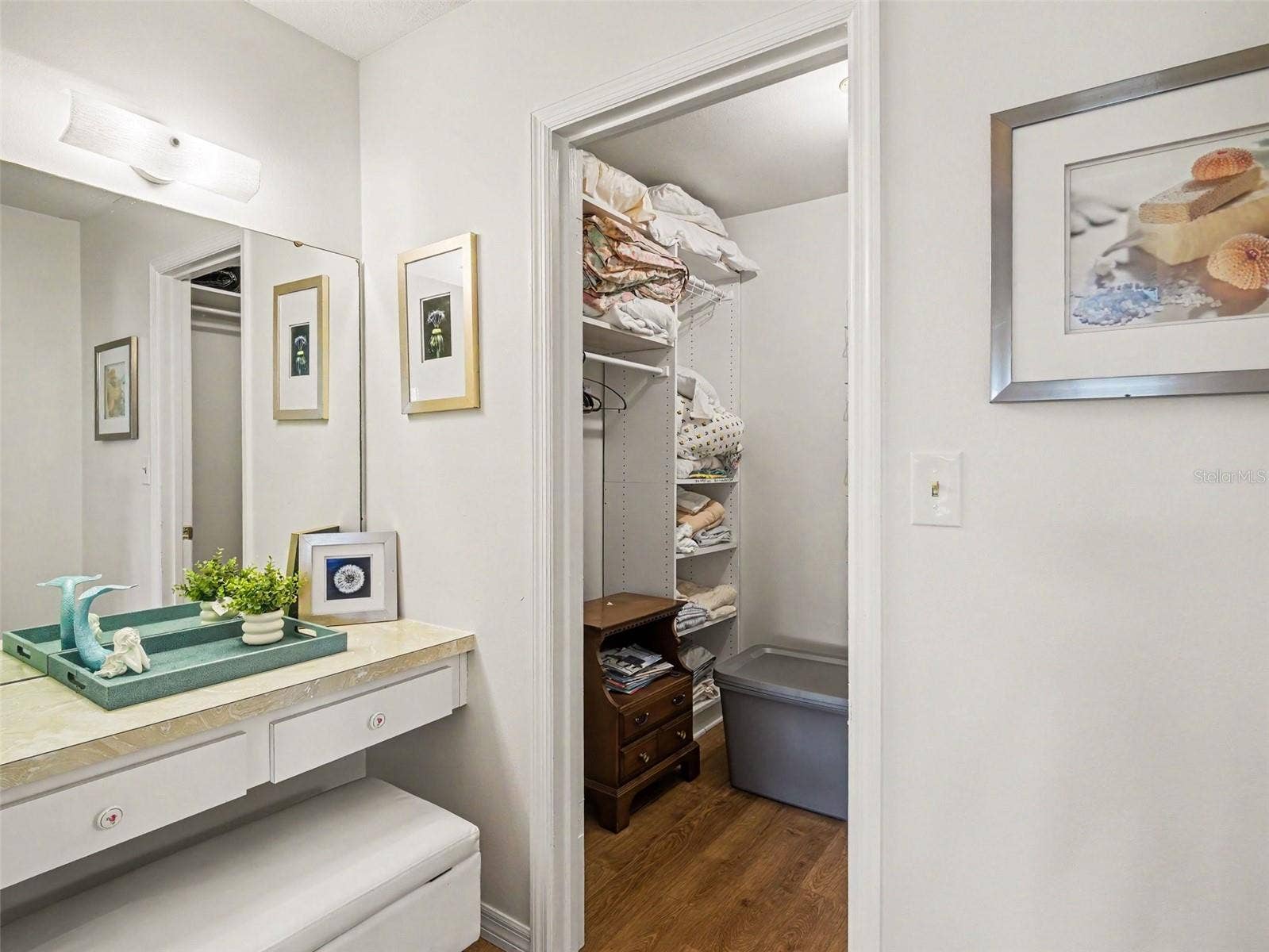 MAKE UP/VANITY AREA ADJACENT TO WALK IN CLOSET