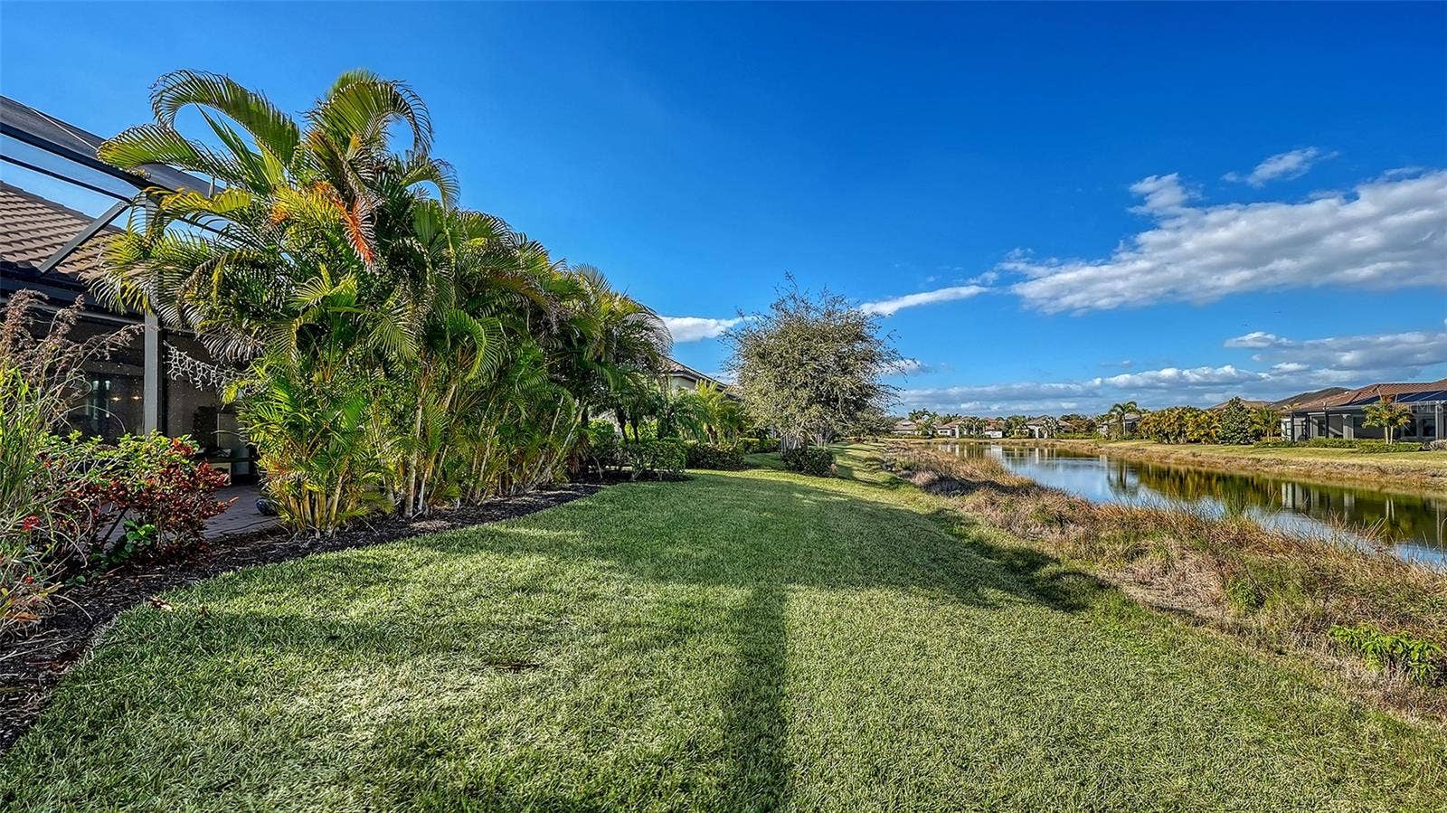 12028 LEGACY ESTATES BOULEVARD, Sarasota, FL 34238 Yard facing West