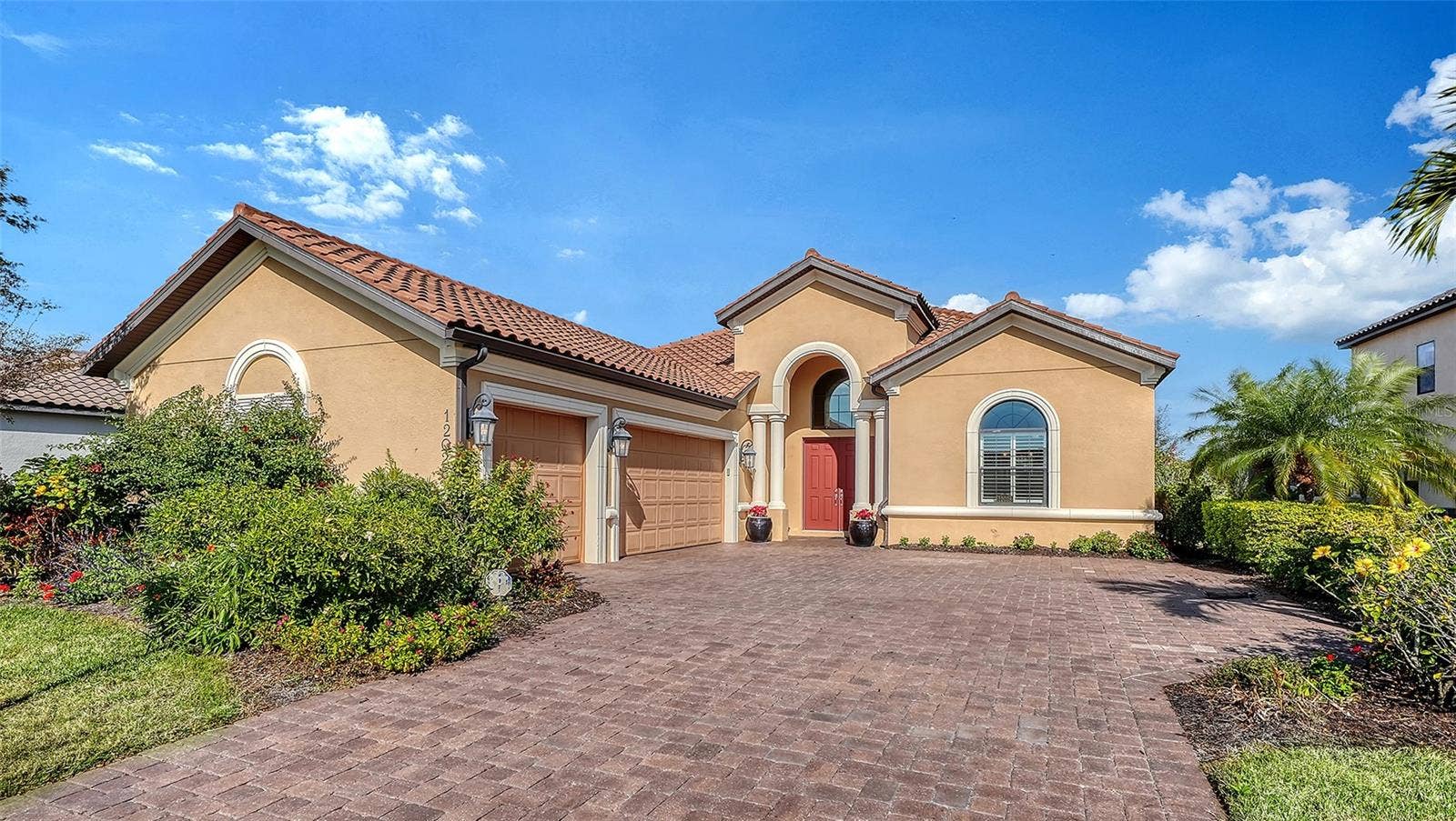 12028 LEGACY ESTATES BOULEVARD, Sarasota, FL 34238 3 Car Side Loaded Garage