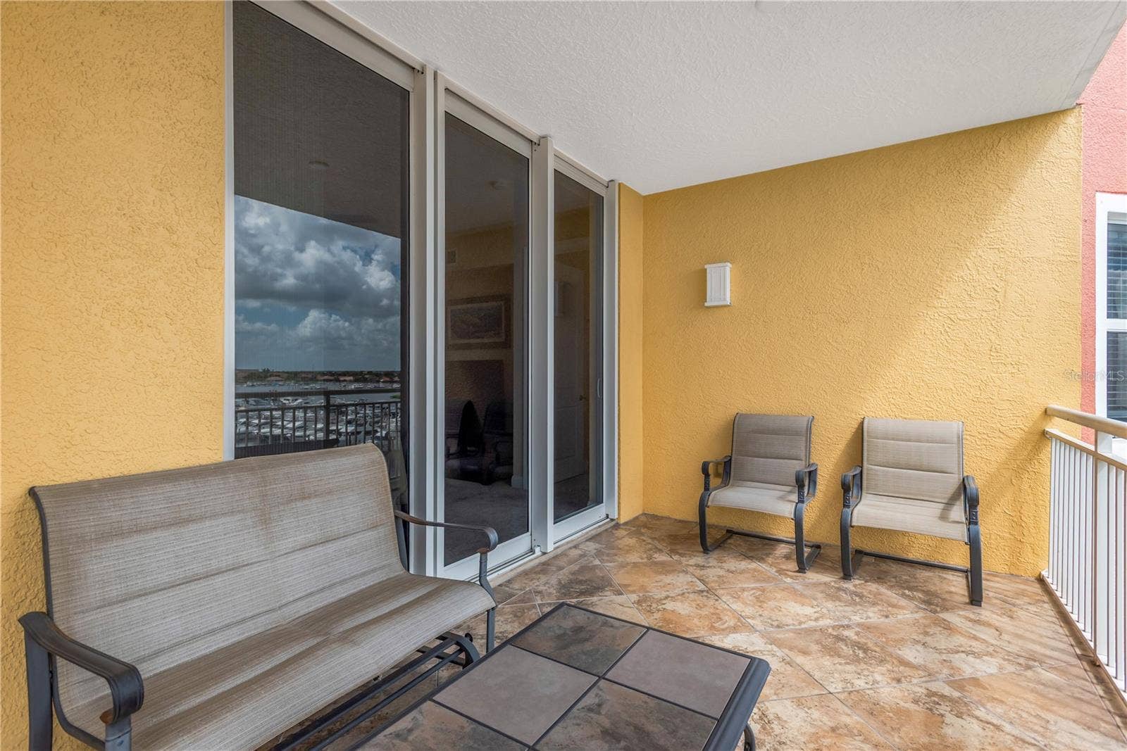 606 RIVIERA DUNES WAY, #405, Palmetto, FL 34221 Covered Lanai overlooking Riviera Dunes Marina