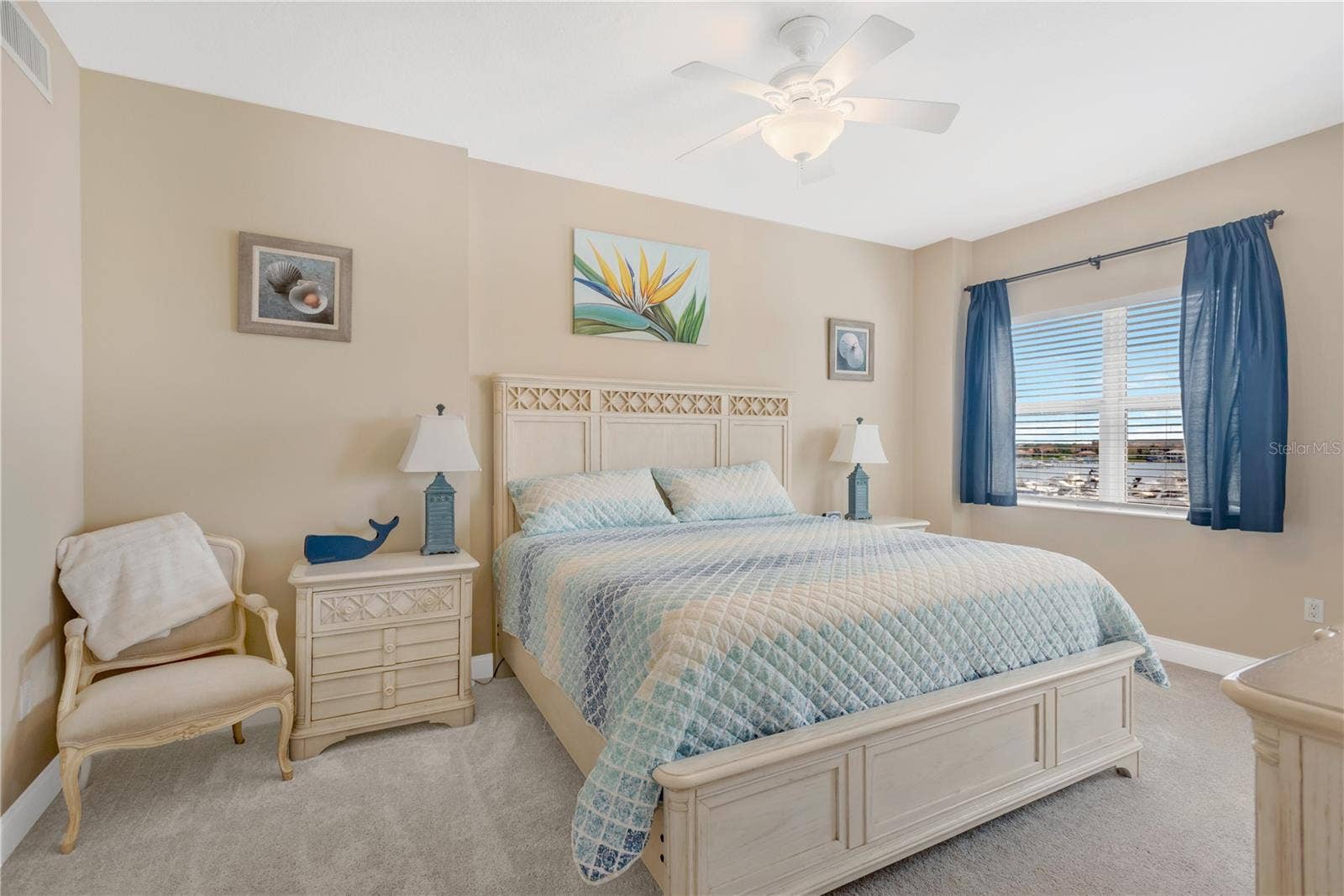 606 RIVIERA DUNES WAY, #405, Palmetto, FL 34221 Primary Bedroom with windows overlooking the Marina