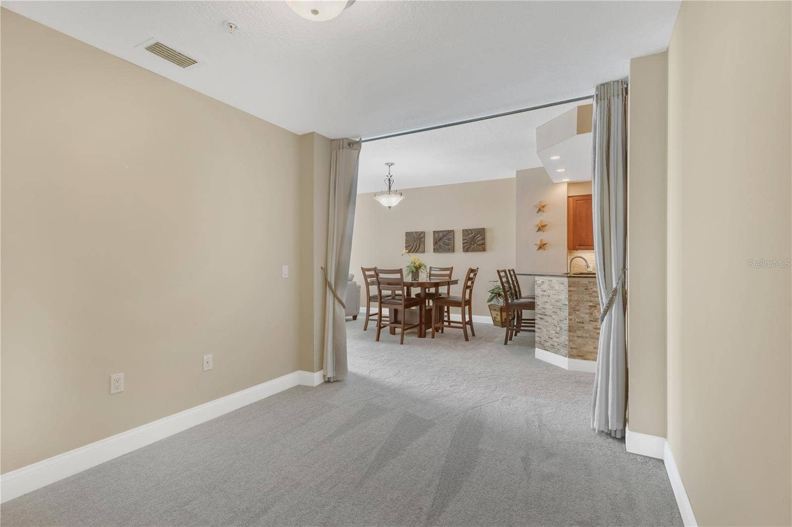 606 RIVIERA DUNES WAY, #405, Palmetto, FL 34221 Flex Room could also be used as an additional guest room when family or friends visit.