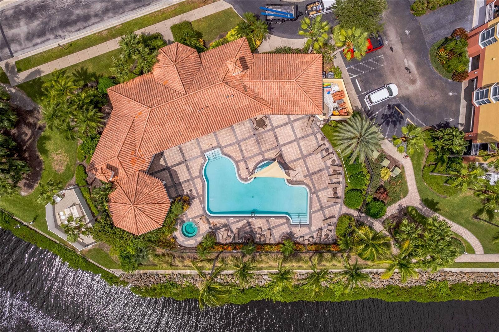 606 RIVIERA DUNES WAY, #405, Palmetto, FL 34221 Clubhouse, Pool and Covered Eating Area with Grills