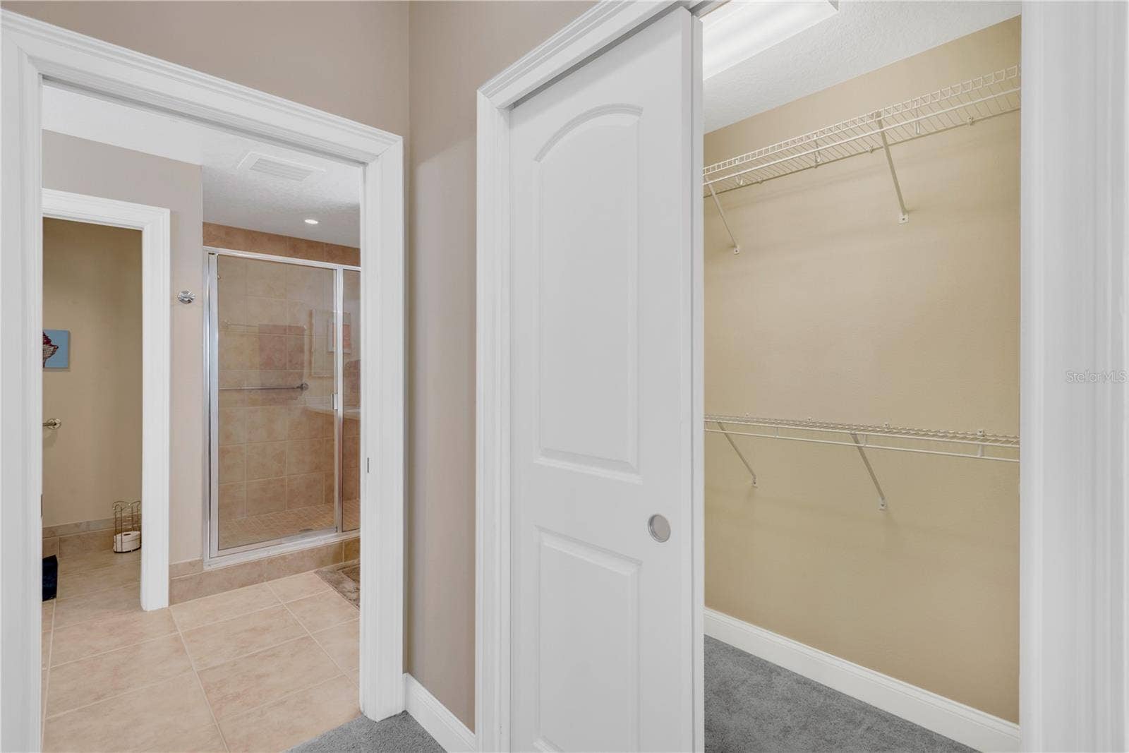 606 RIVIERA DUNES WAY, #405, Palmetto, FL 34221 2 Closets - one Built-in and one Walk-in in the hallway leading to the En-suite Bath