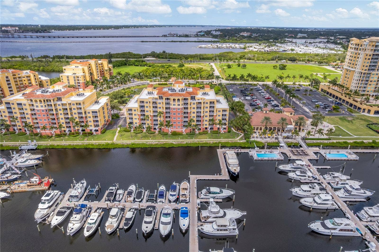 606 RIVIERA DUNES WAY, #405, Palmetto, FL 34221 Riviera Dunes Marina with a Water side view of the condo