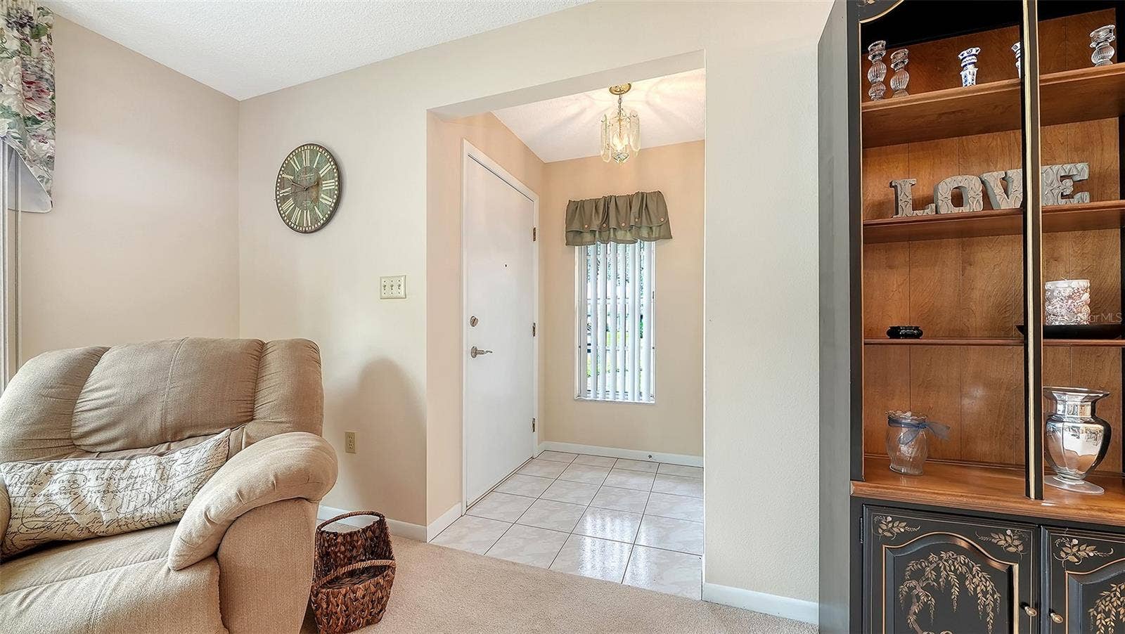 Entrance with coat closet.
