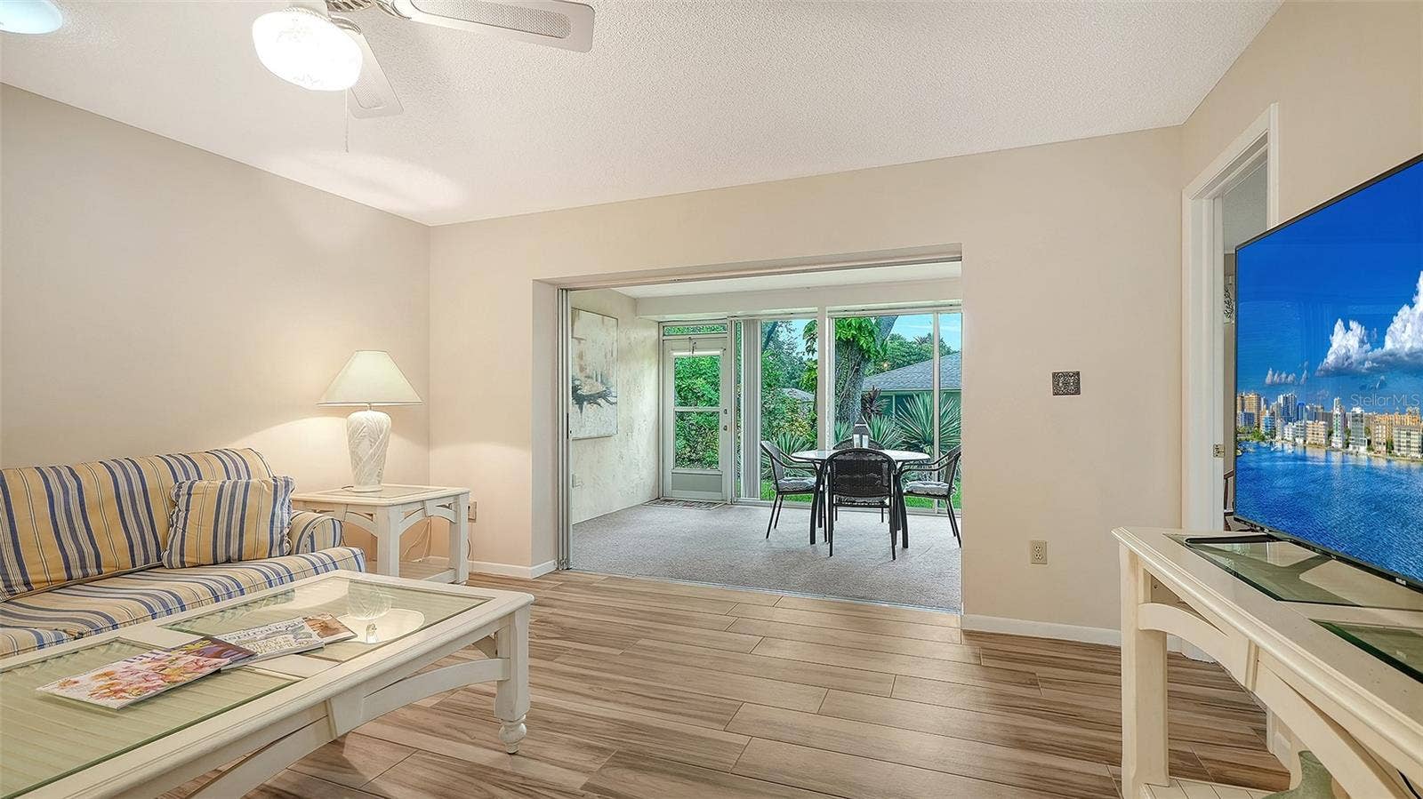 The family room connects to the lanai through the sliders that pocket.