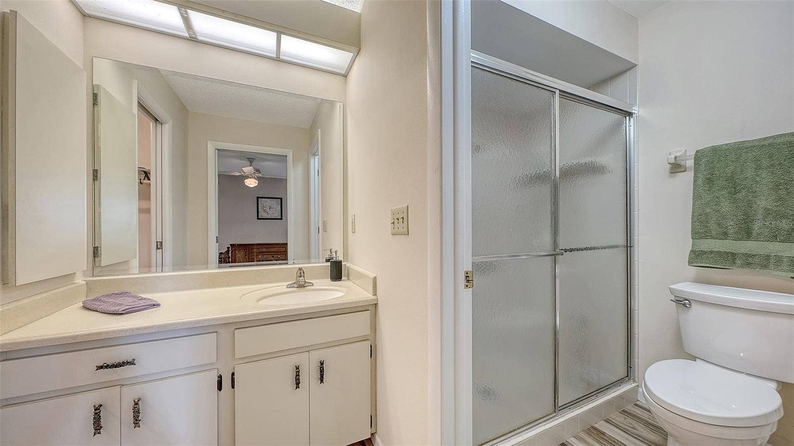 The main bath has a walk-in shower.