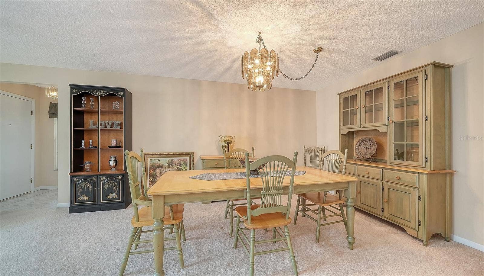 Large dining room for your entertaining pleasure.