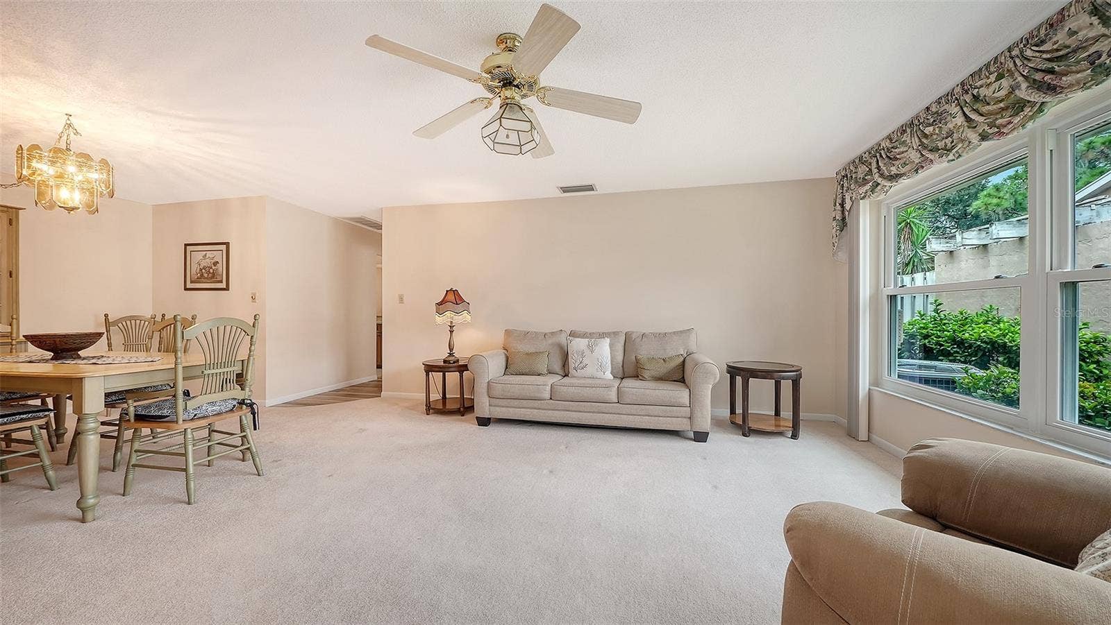 Spacious living room with dining room.