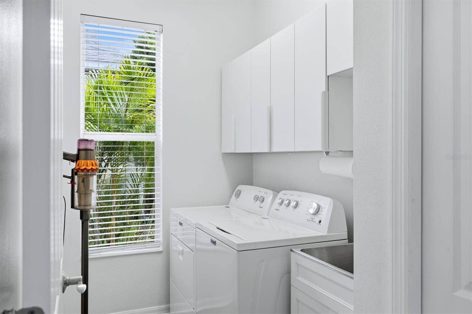 Laundry with storage and new appliances
