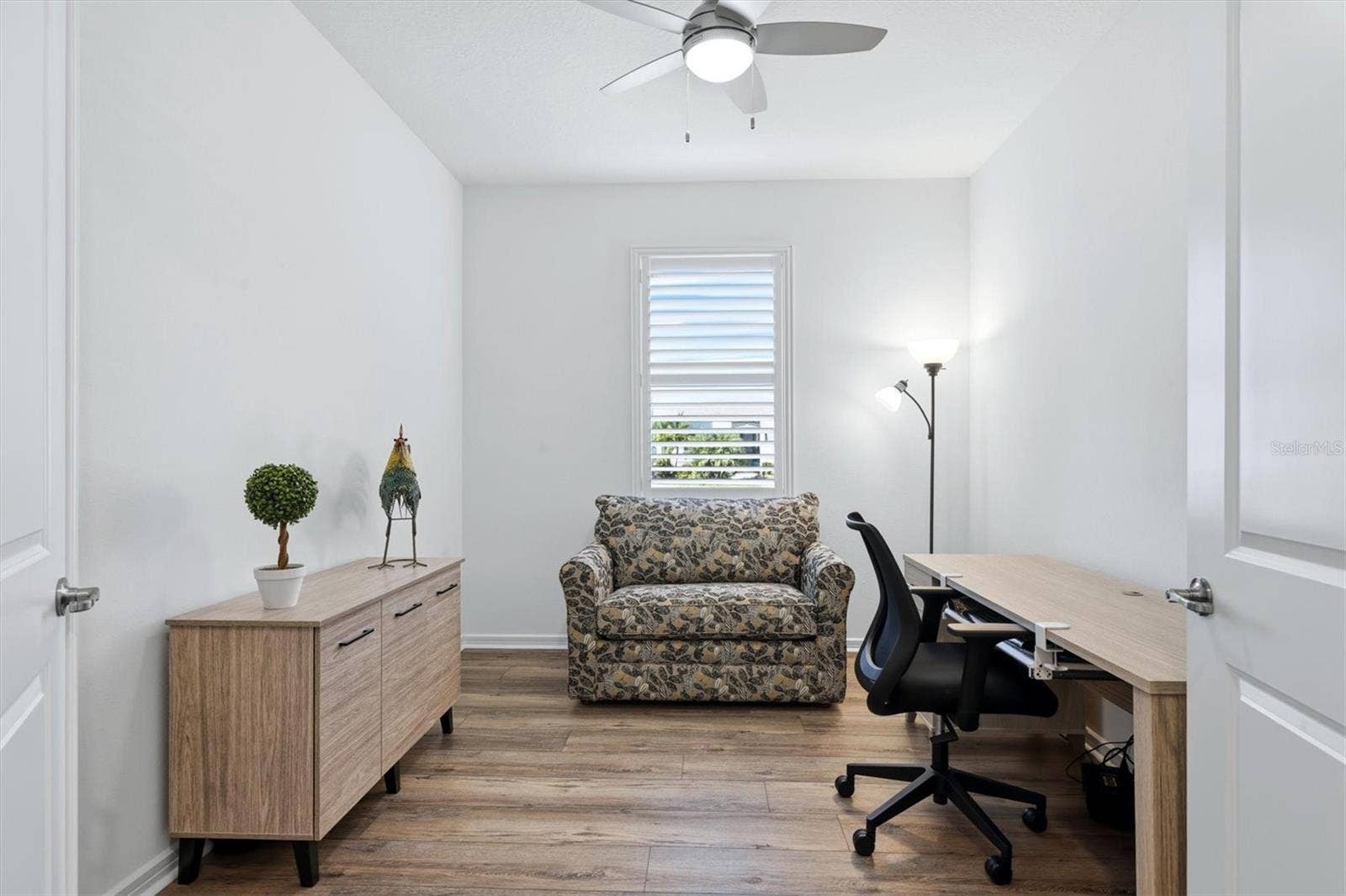 10635 WYNWARD WAY, Parrish, FL 34219 Den with double doors/ feels larger than it appears in the photo!