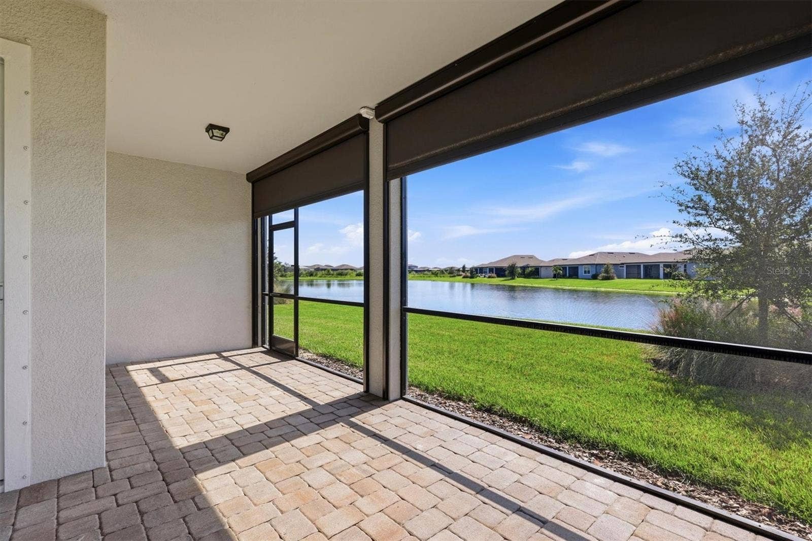 10635 WYNWARD WAY, Parrish, FL 34219 Electric shades for light and wind control