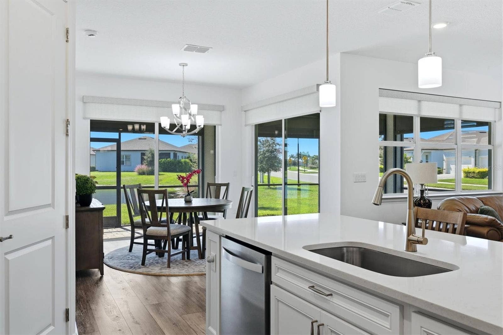 10635 WYNWARD WAY, Parrish, FL 34219 Electric shades on sliders and lanai for privacy and light control