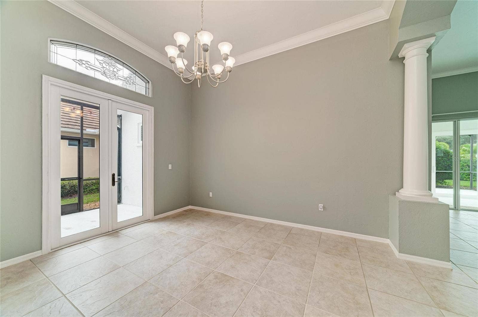 7816 HERITAGE CLASSIC COURT, Lakewood Ranch, FL 34202 French Doors form Dining Room to Patio