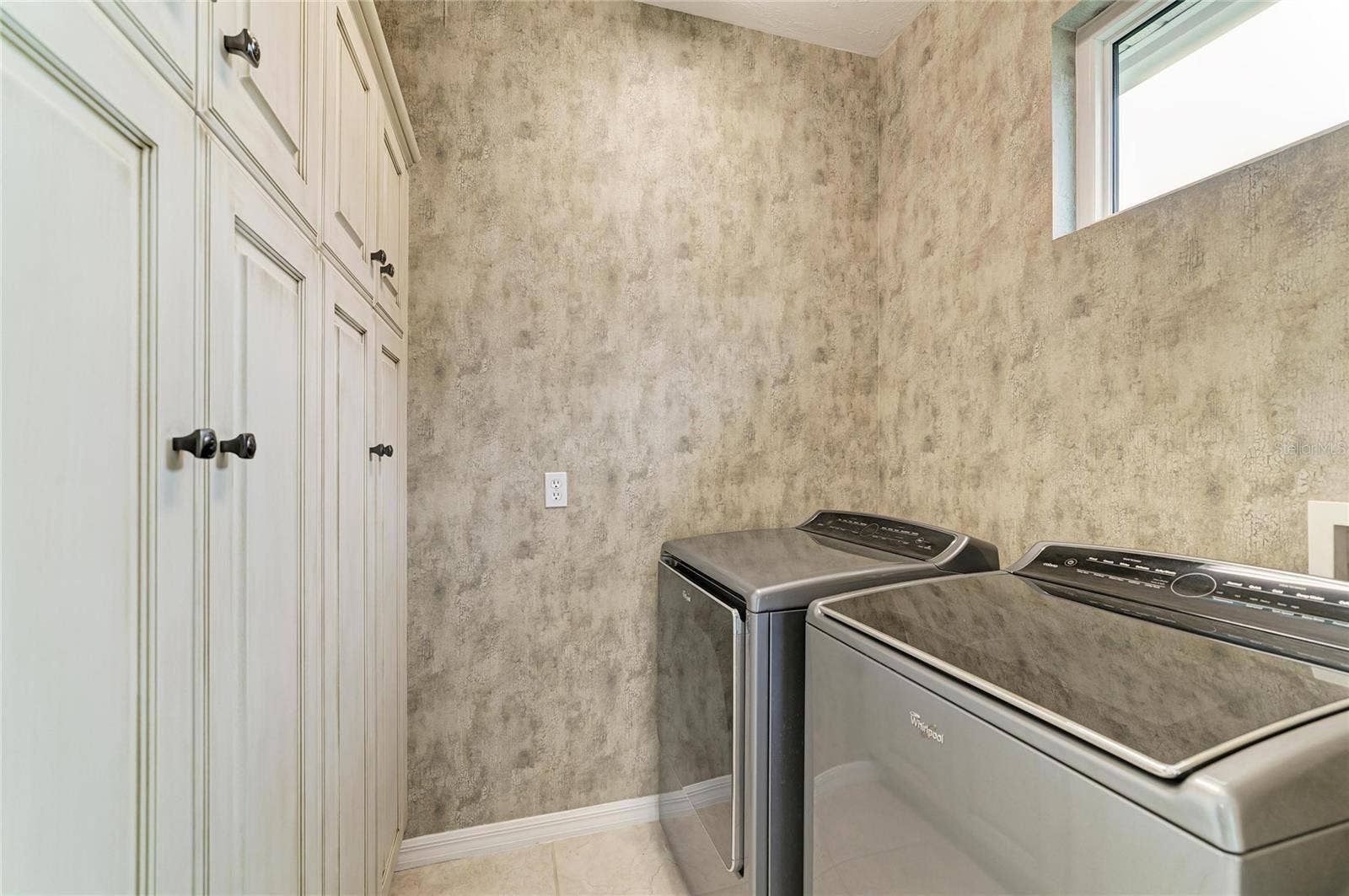 7816 HERITAGE CLASSIC COURT, Lakewood Ranch, FL 34202 Laundry Room with wall of cabinets