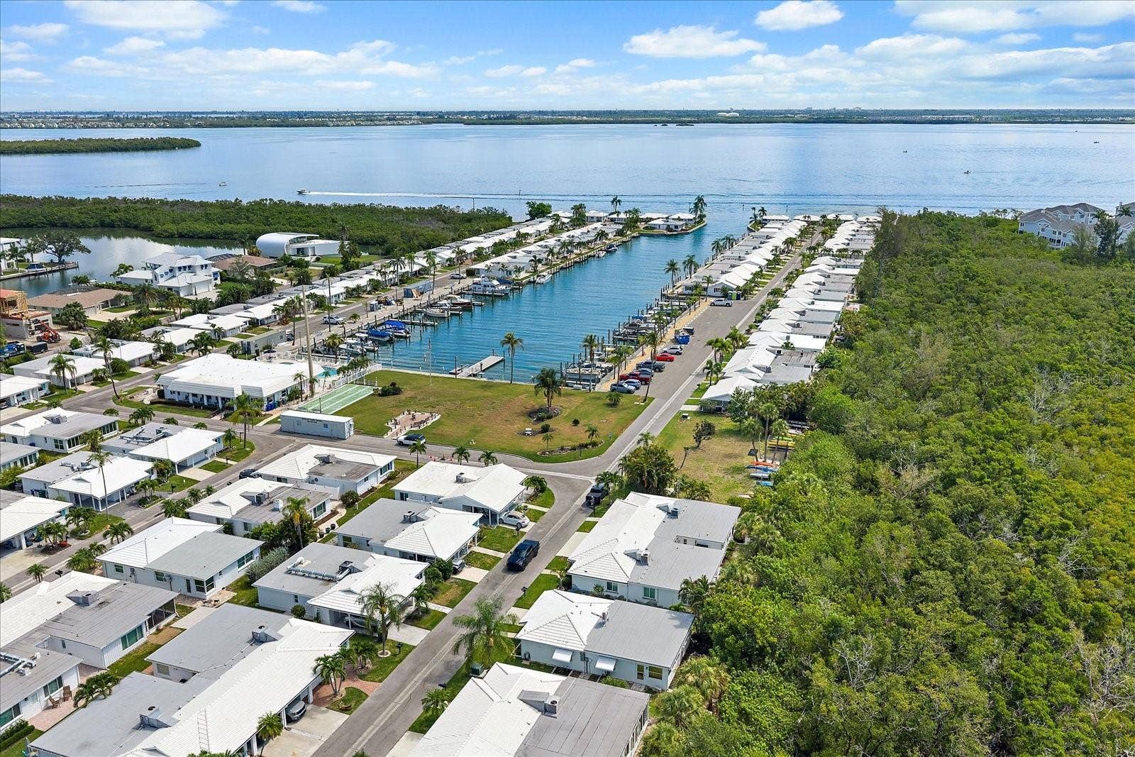 Aerial view of marina canal adjacent to the community