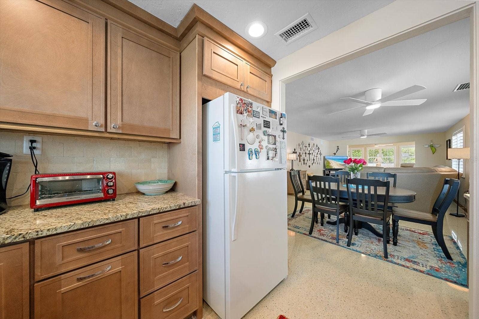 Kitchen pass-through to living and dining area