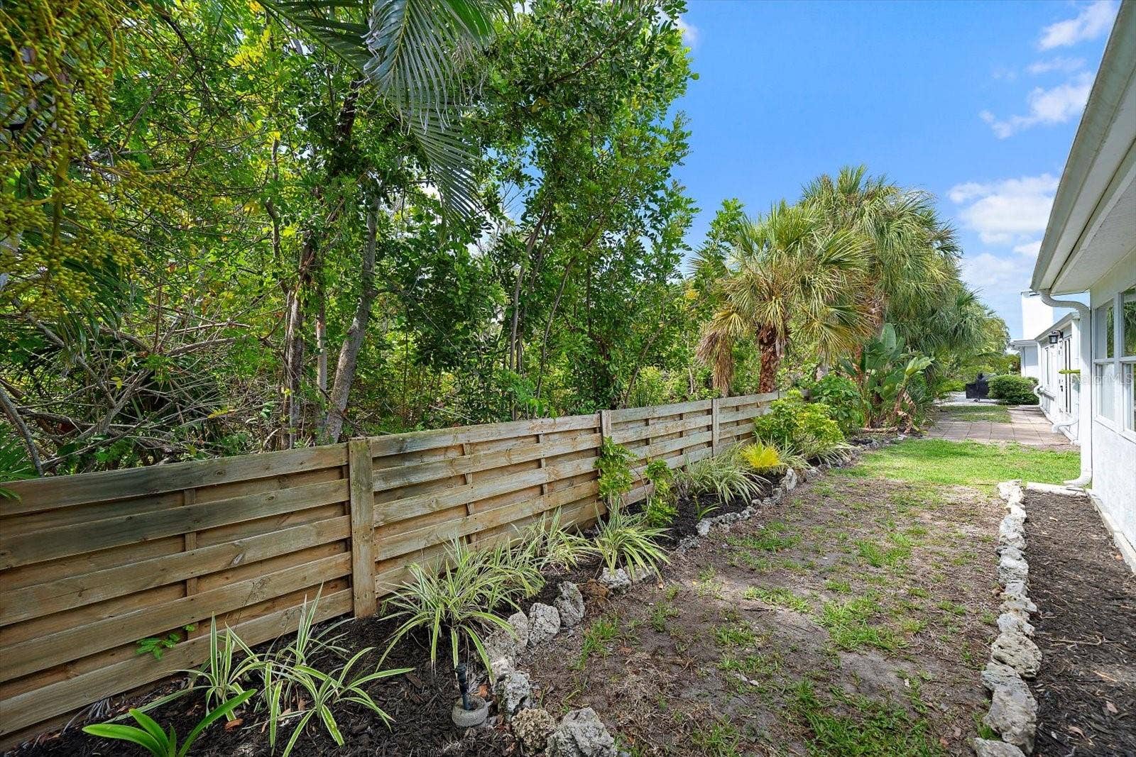 Side yard with privacy fence