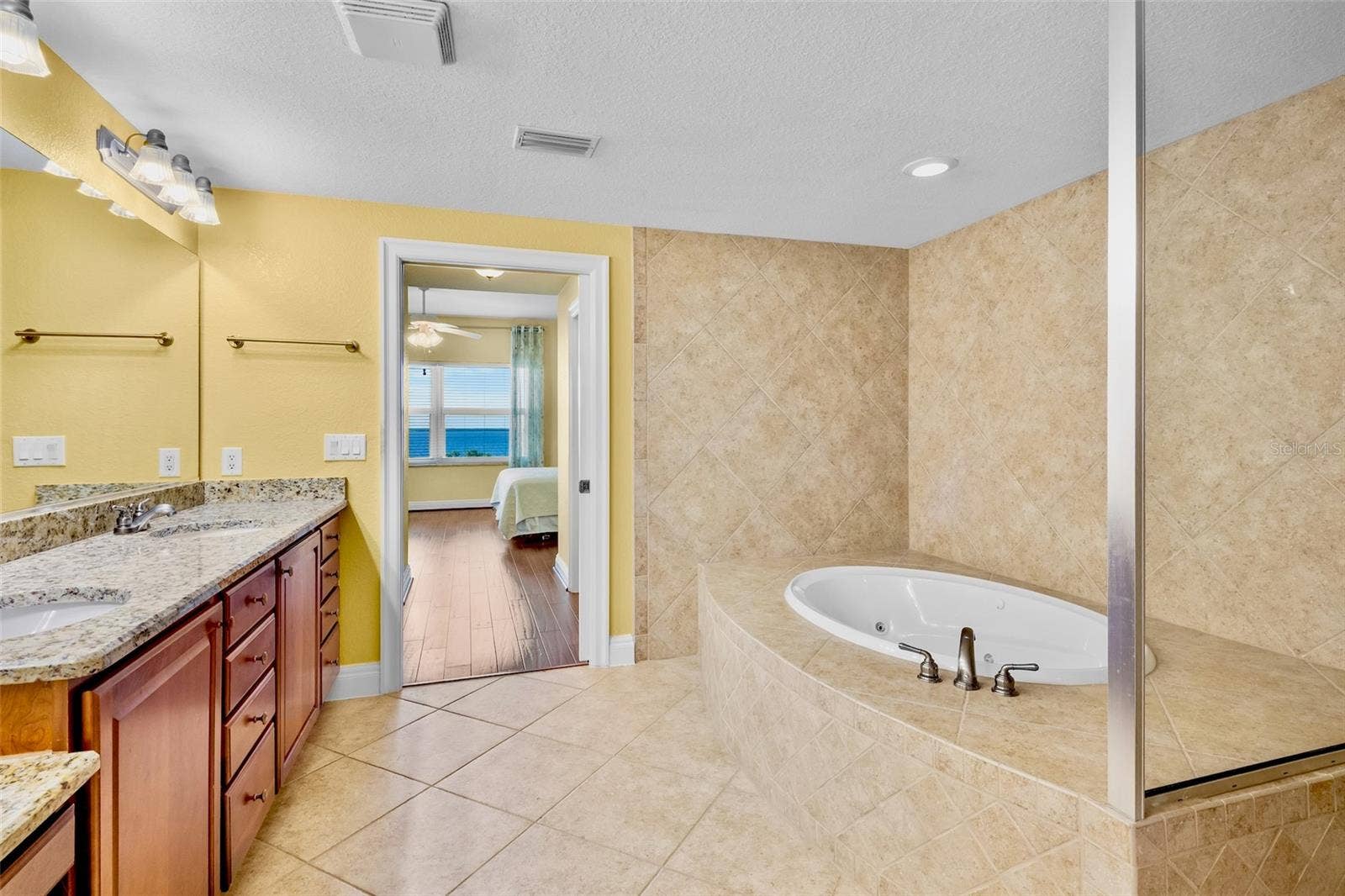 2825 TERRA CEIA BAY BOULEVARD, #1402, Palmetto, FL 34221 Primary bath with garden tub and walk-in shower.