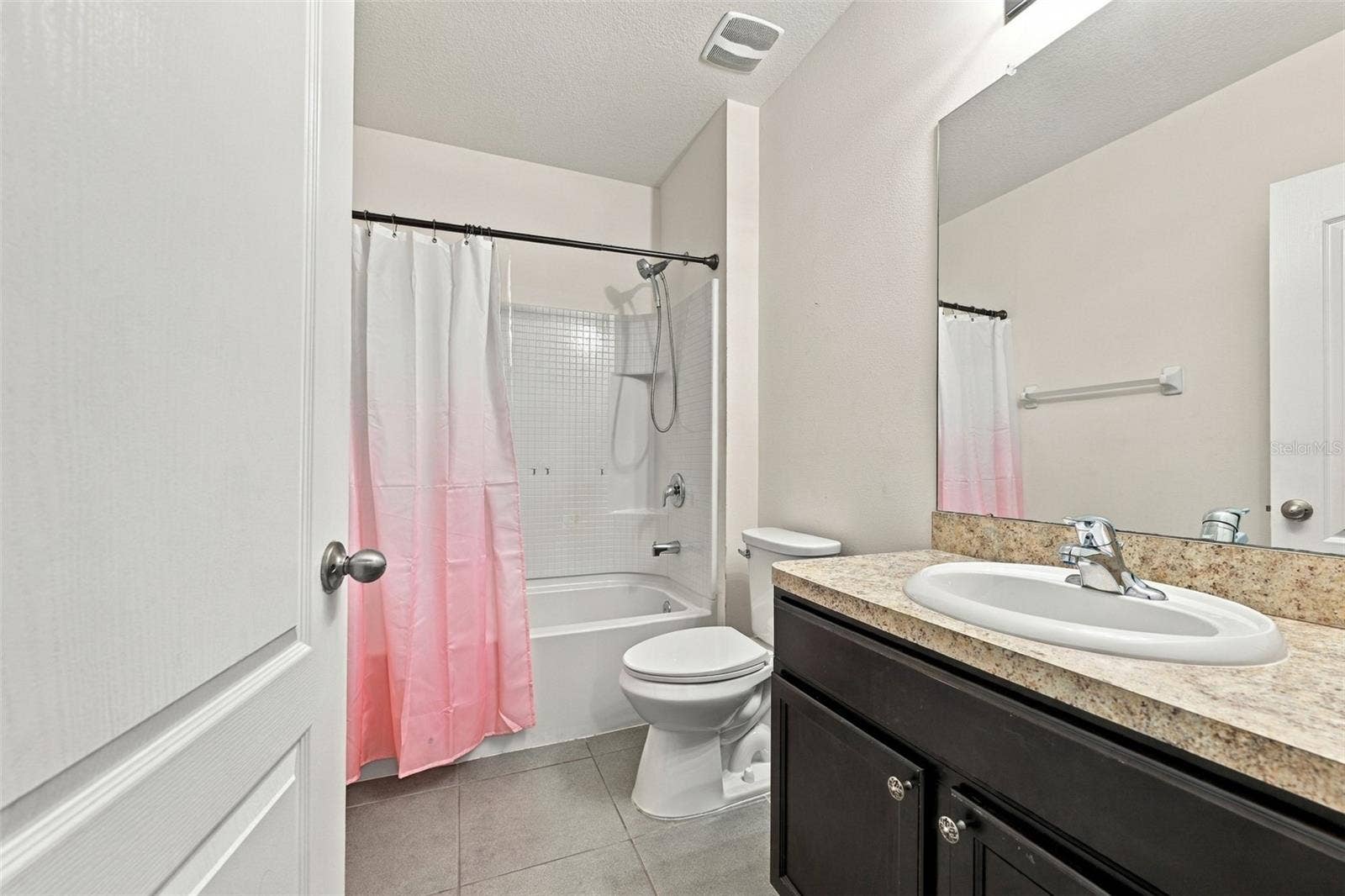 5213 11TH STREET E, Bradenton, FL 34203 Guest bathroom