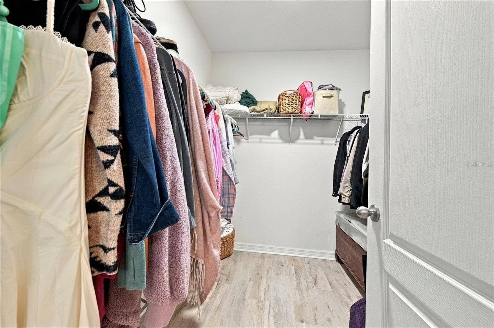 5213 11TH STREET E, Bradenton, FL 34203 One of two primary bedroom closets