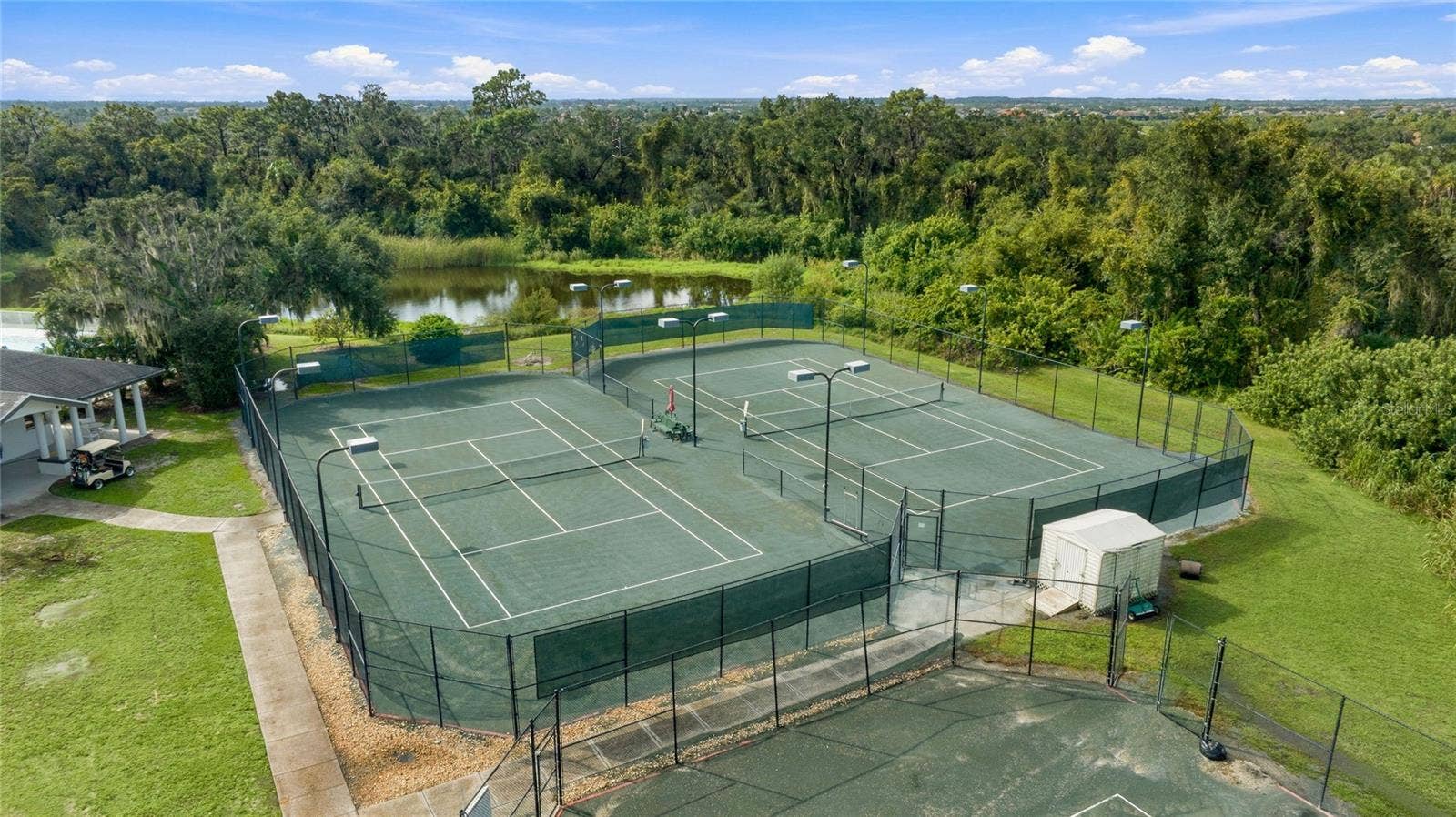 3306 LITTLE COUNTRY ROAD, Parrish, FL 34219 Lighted tennis center at River Wilderness