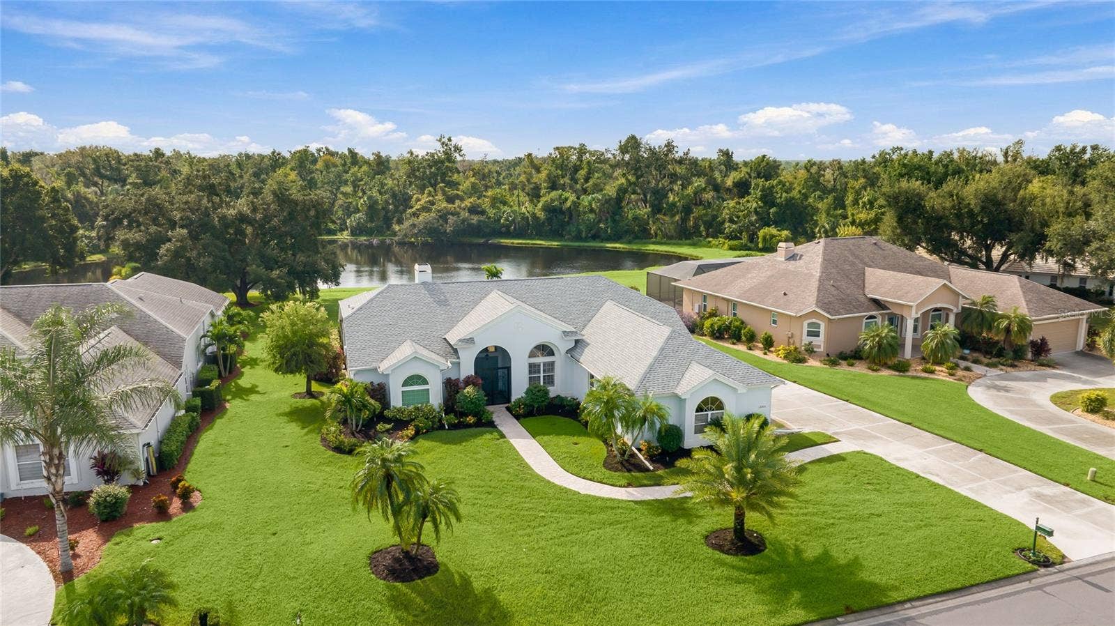 3306 LITTLE COUNTRY ROAD, Parrish, FL 34219 Amazing lake views with mature landscaping, set against a certified nature preserve.