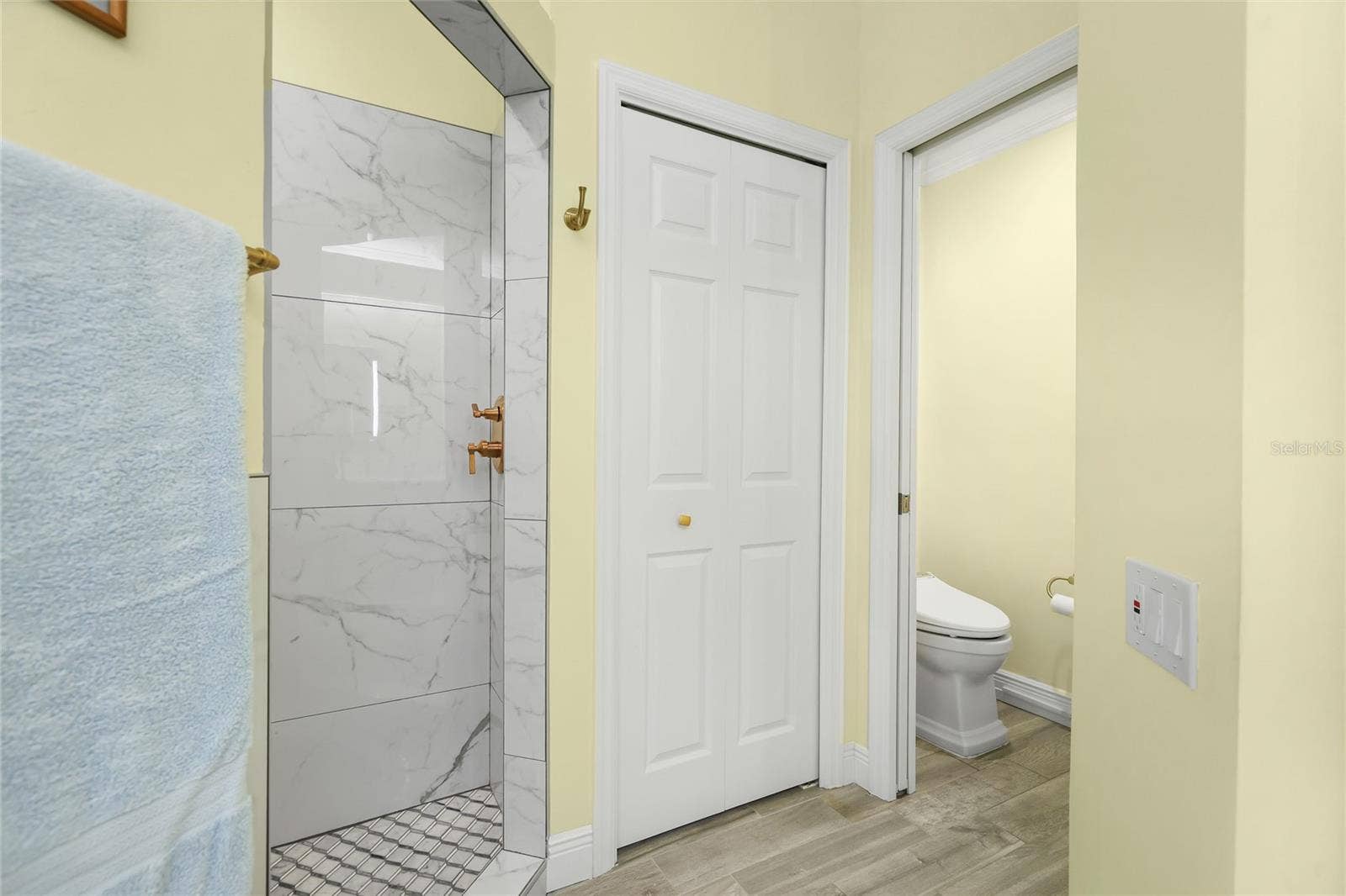 3306 LITTLE COUNTRY ROAD, Parrish, FL 34219 Primary bathroom walk-in shower and private water closet