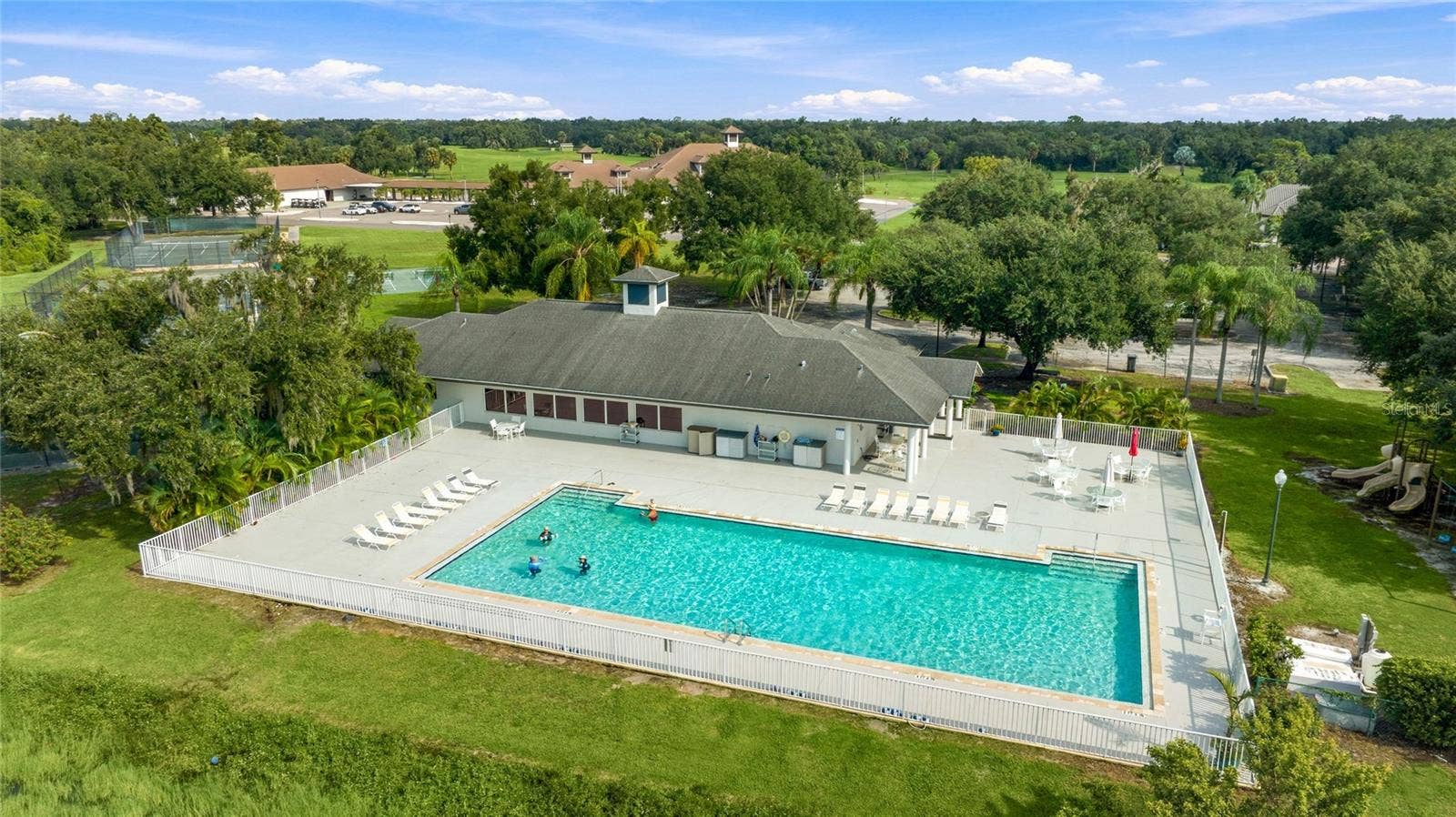 3306 LITTLE COUNTRY ROAD, Parrish, FL 34219 A Junior Olympic-size pool at the club.