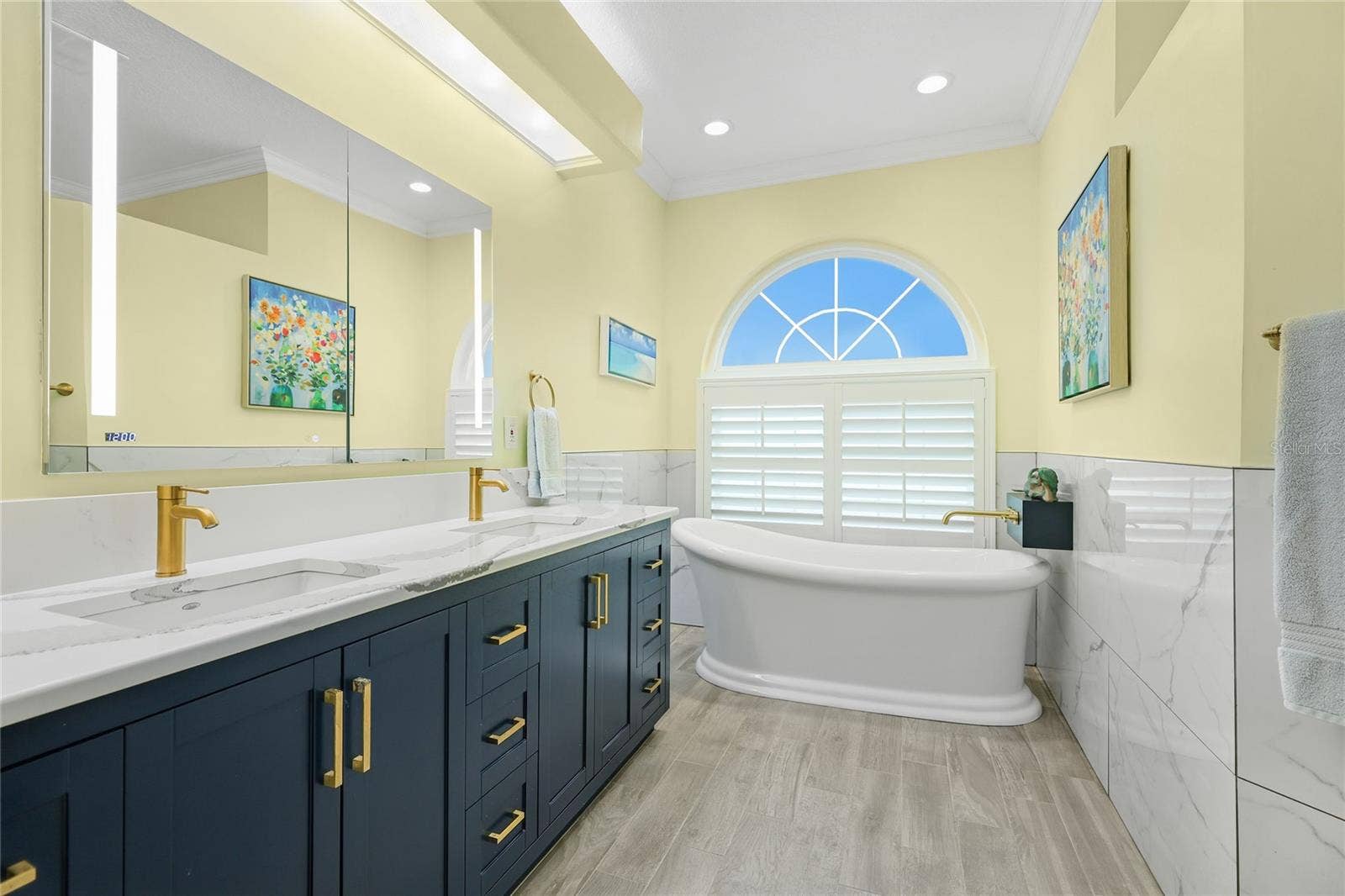 3306 LITTLE COUNTRY ROAD, Parrish, FL 34219 Primary en-suite has been completely renovated, featuring a slipper tub, updated plumbing & fixtures, new vanity cabinet, Toto toilet, and walk-in shower