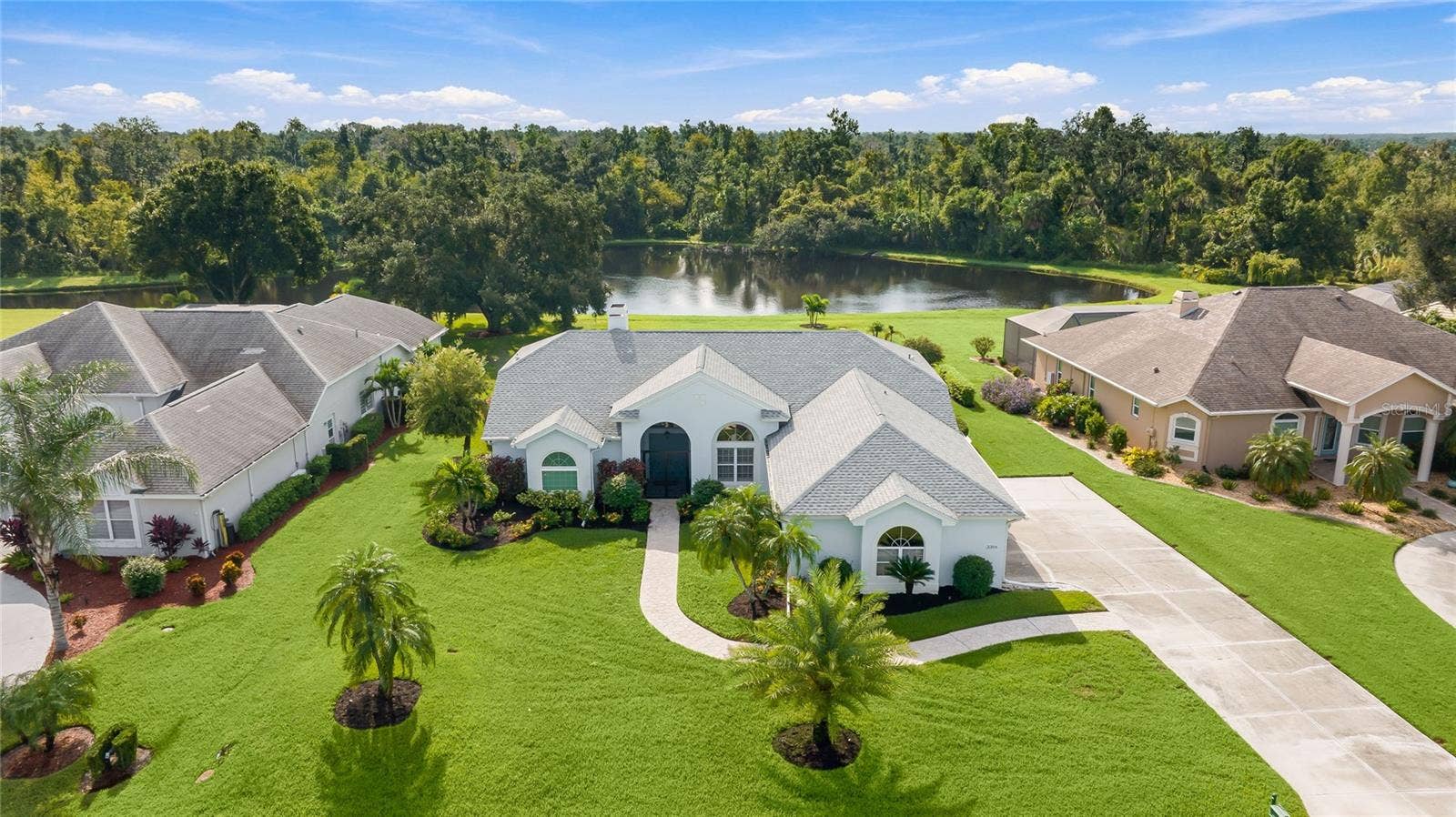 3306 LITTLE COUNTRY ROAD, Parrish, FL 34219 Welcome to the River Wilderness lifestyle: lake views, large lots, amenities, activities and a well-maintained home